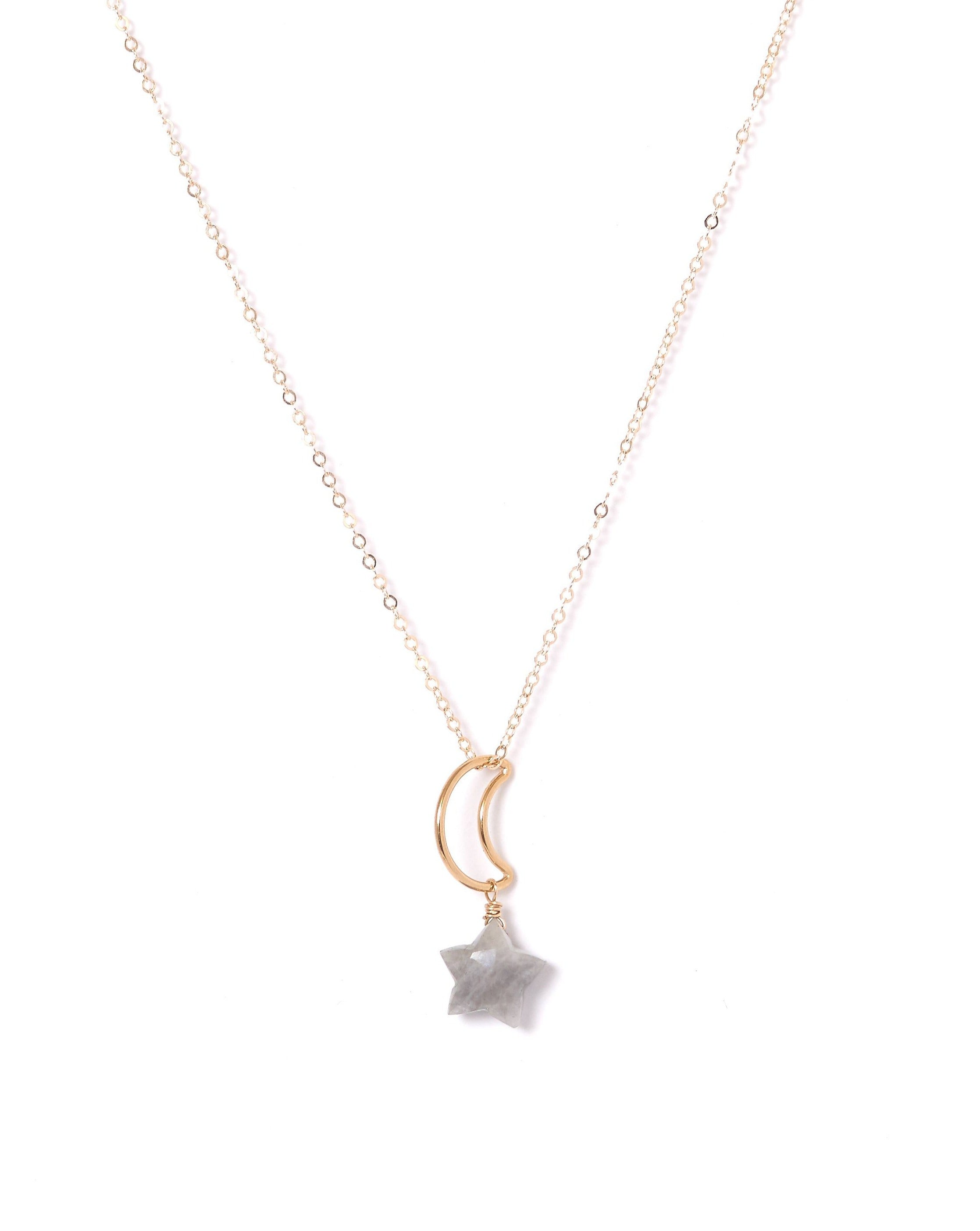 Lunastar Necklace by KOZAKH. A 16 to 18 inch adjustable length necklace, crafted in 14K Gold Filled, featuring a 13mm moon charm and a Grey Moonstone star charm.