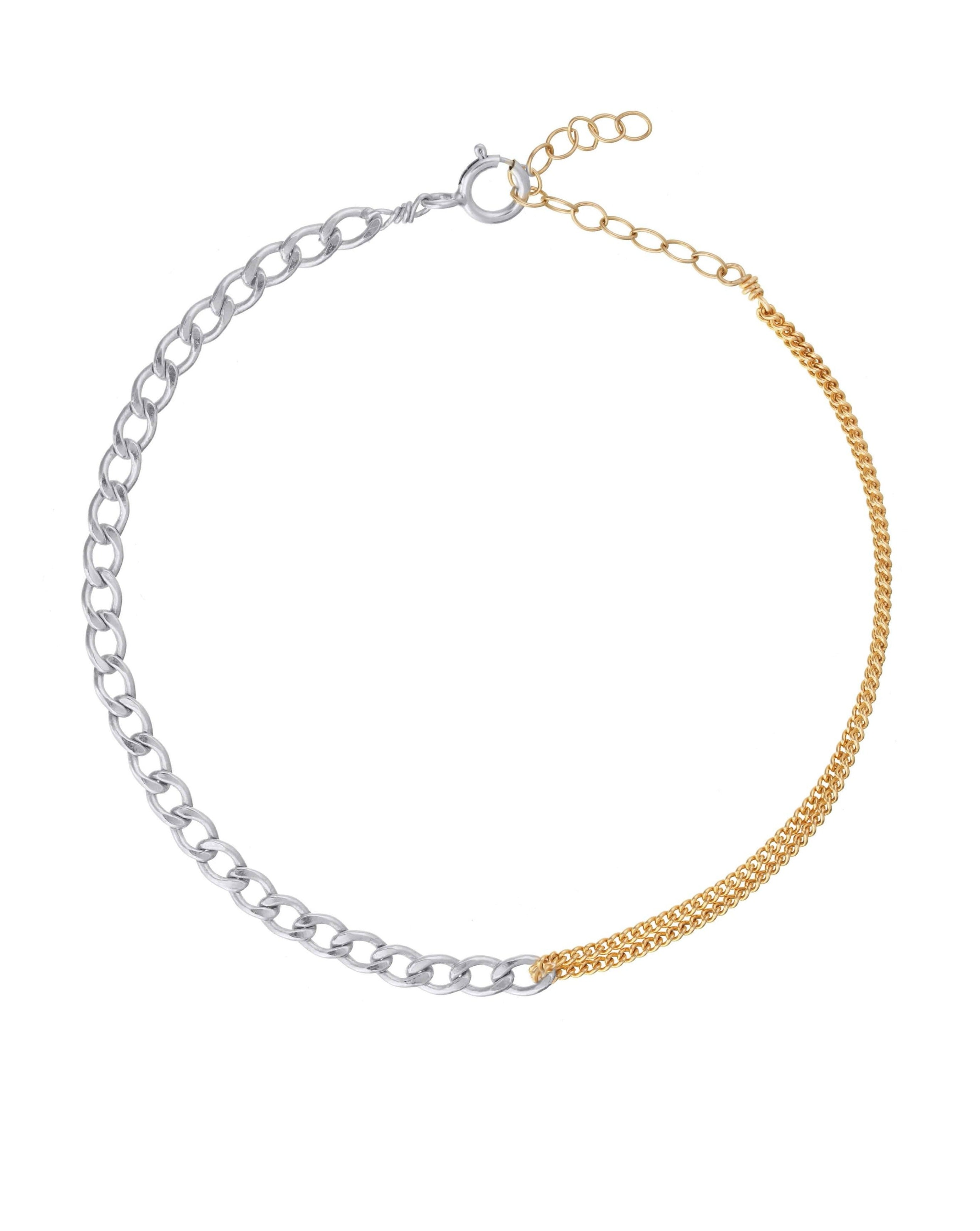 Moni Anklet by KOZAKH. A 9 to 11 inch adjustable length combo anklet with Gold Filled flat link chain on one half and Sterling Silver Cuban link chain on the other half.