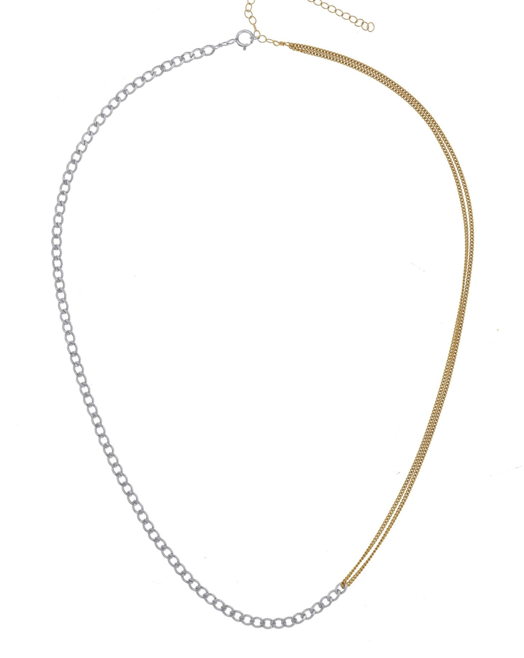 Monica Necklace by KOZAKH. A 14 to 16 inch adjustable length two tone necklace with gold box chain on one half and silver braided chain on the other half.