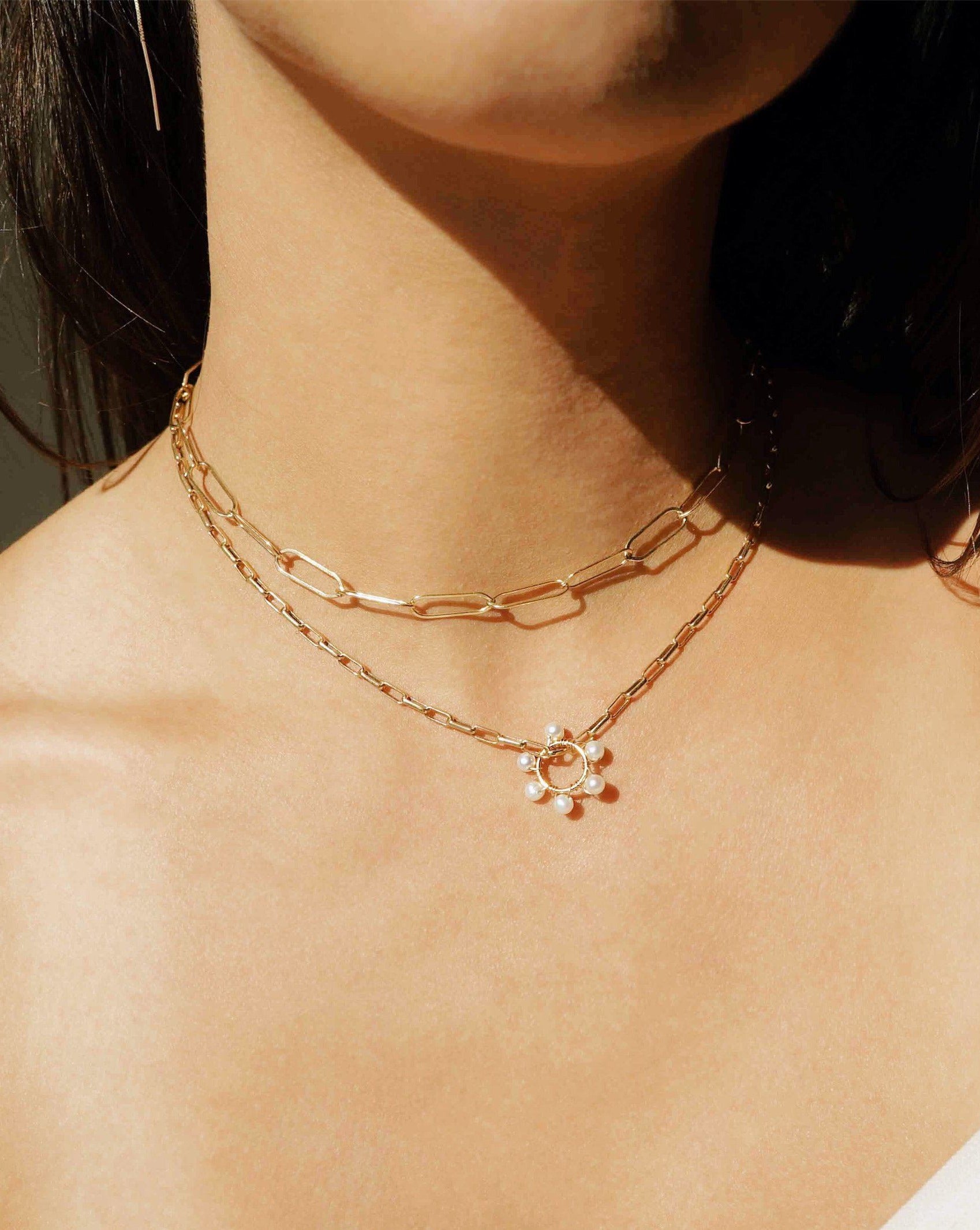 Muse Chain Necklace by KOZAKH. A 14 to 16 inch adjustable length, flat oval link chain necklace, crafted in 14K Gold Filled.