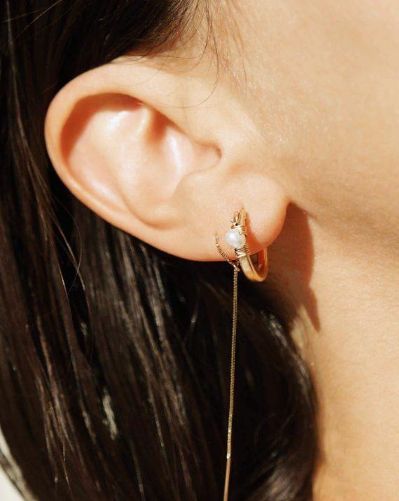 Natalie Earrings by KOZAKH. 12mm snap closure hoop earrings in 14K Gold Filled, featuring a 7mm white potato Pearl.