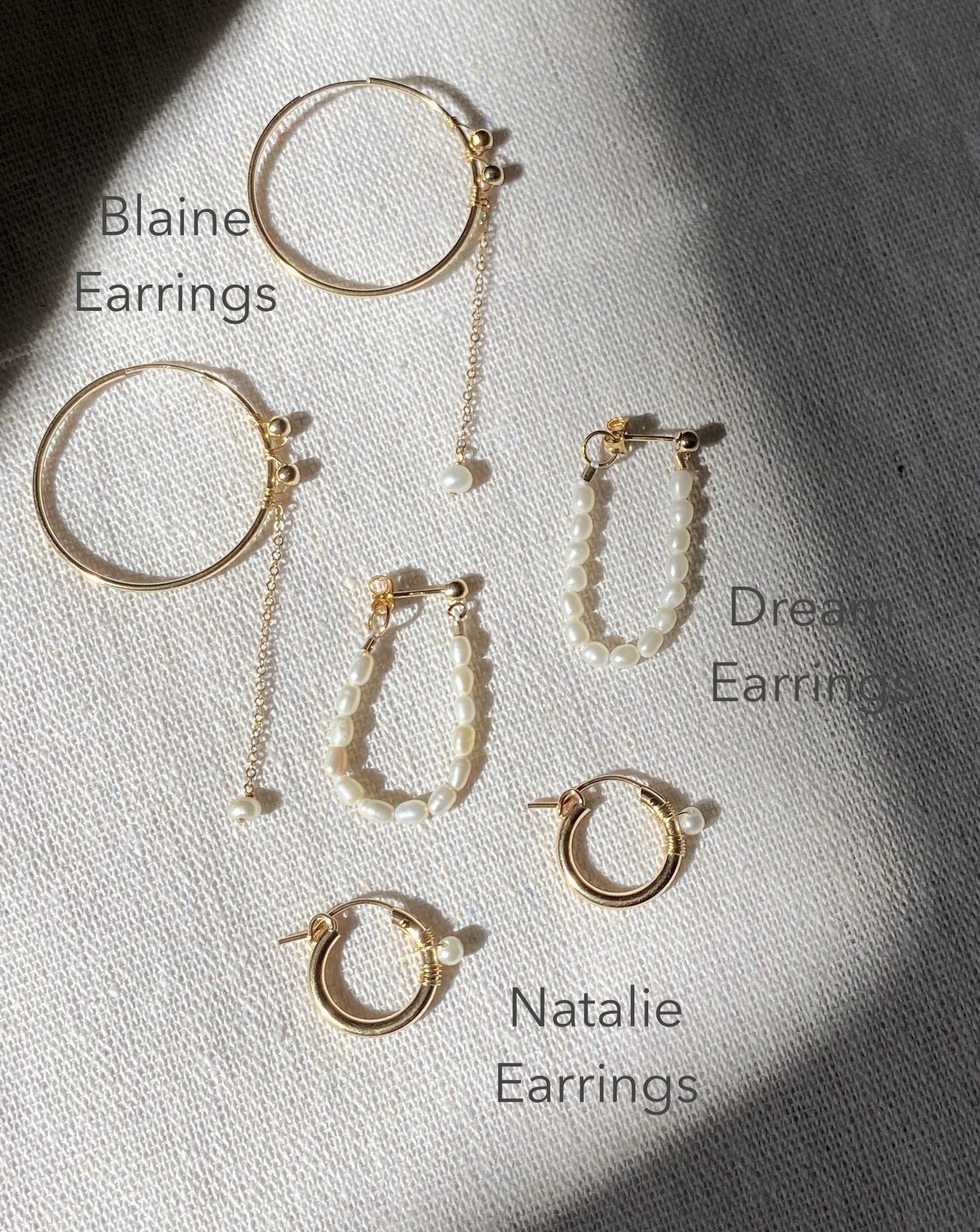 Natalie Earrings by KOZAKH. 12mm snap closure hoop earrings in 14K Gold Filled, featuring a 7mm white potato Pearl.