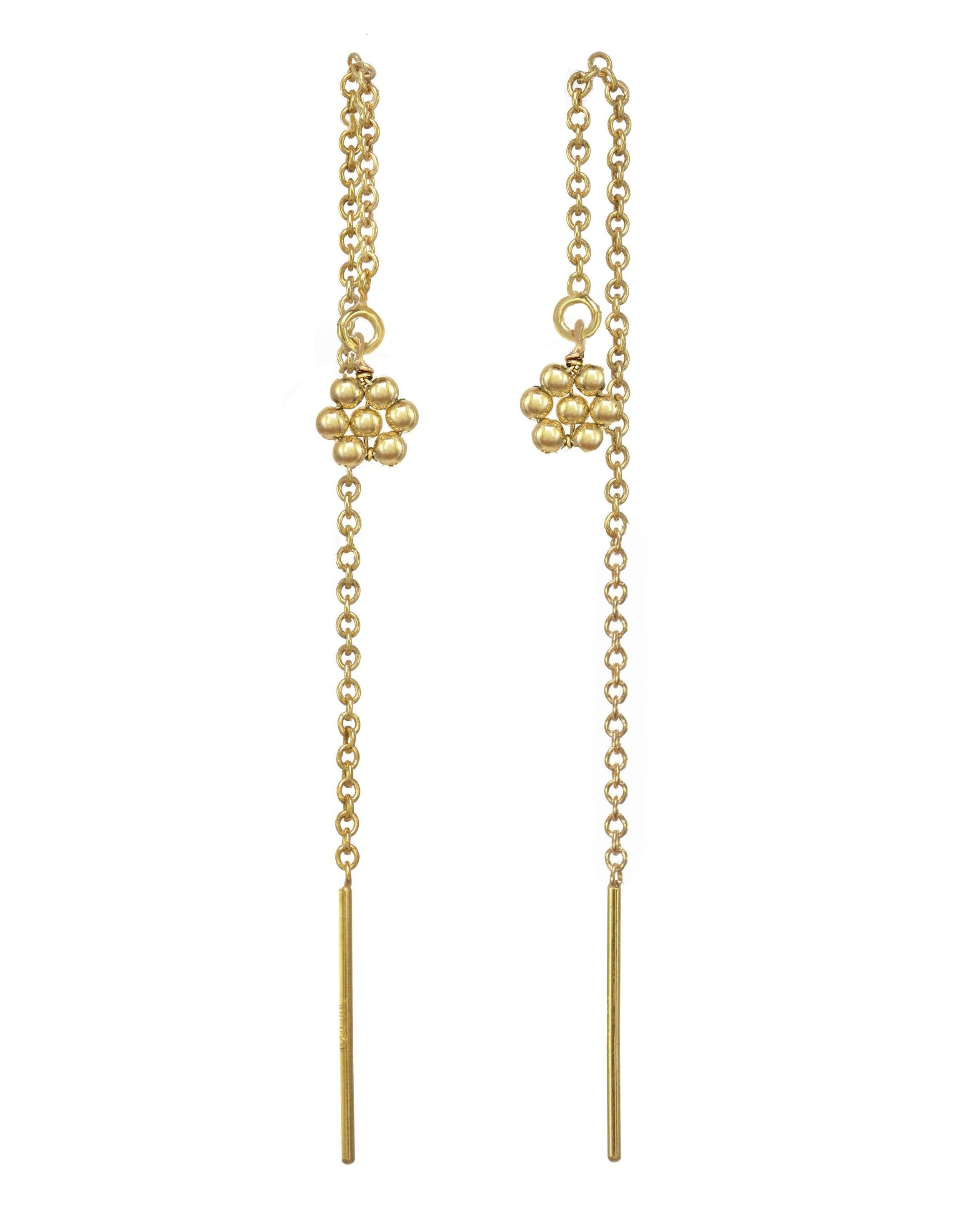 Noor Threader Earrings by KOZAKH. Threader style earrings, crafted in 14K Gold Filled, featuring handmade beaded daisy charms.