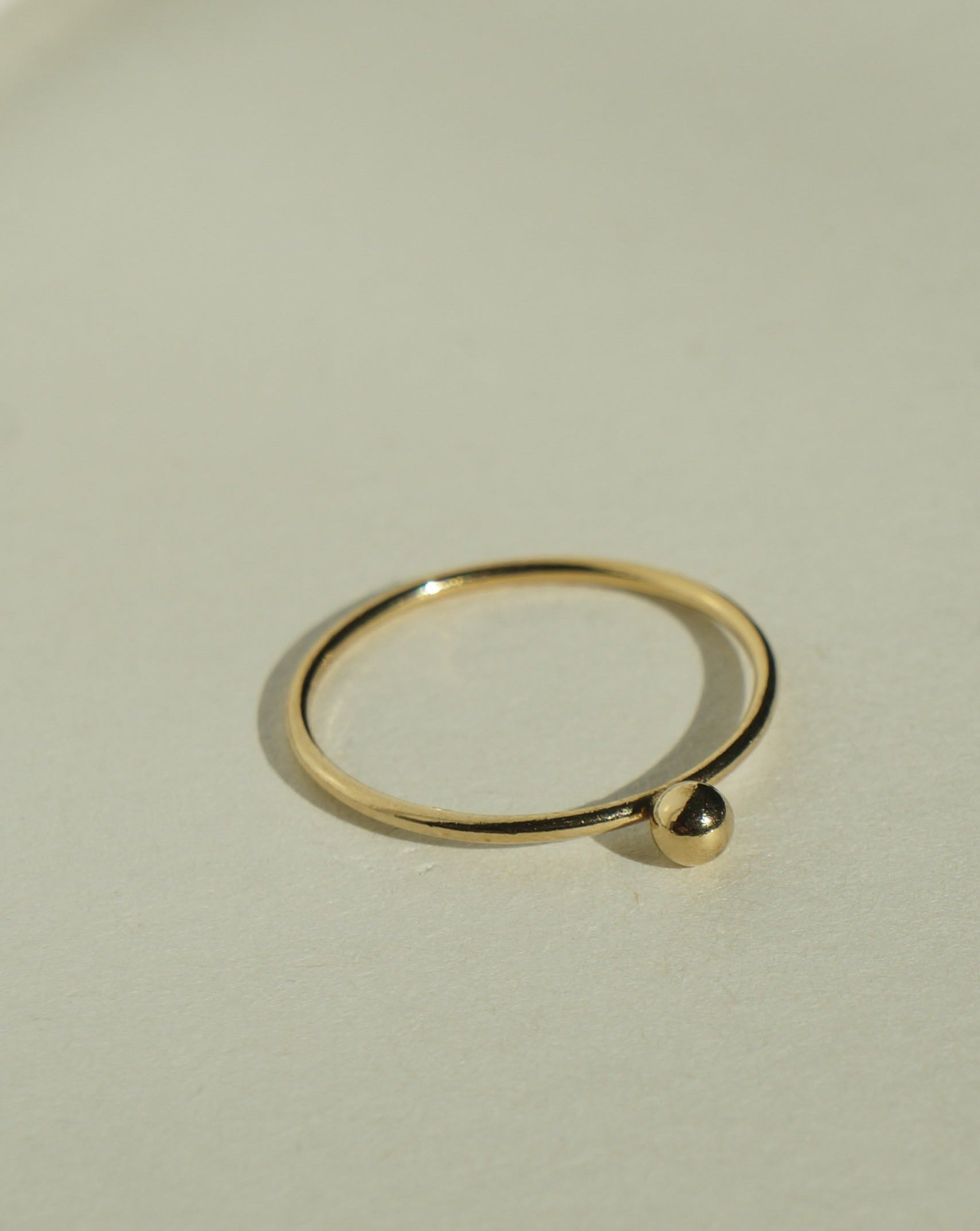 Point Ring by KOZAKH. A ring crafted in 14K Gold Filled, featuring a 3mm seamless bead.