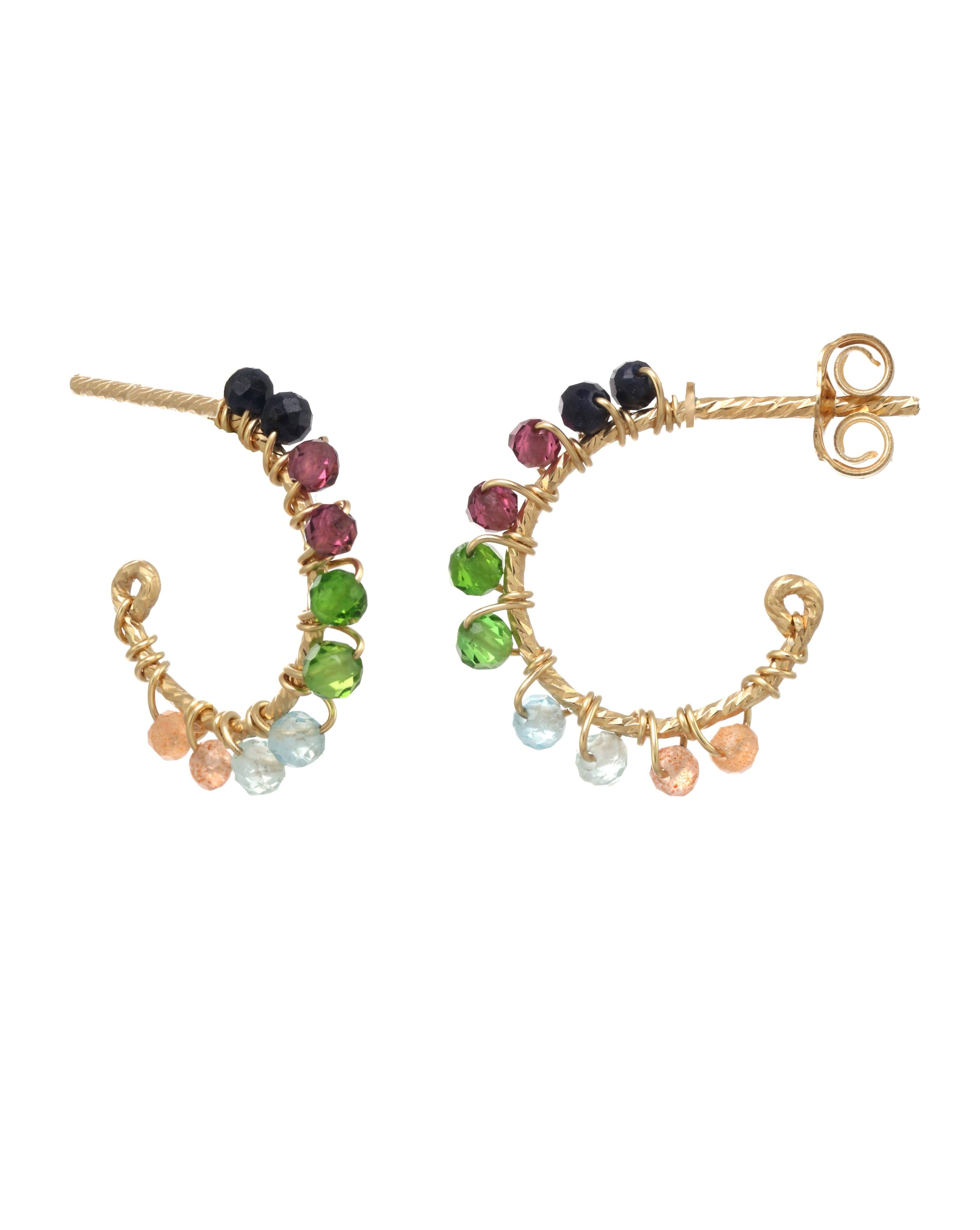 Sadie Hoop Earrings by KOZAKH. Hoop shape stud earrings in 14K Gold Filled, featuring faceted 2mm Aquamarine, Garnet, Imperial Topaz, Emerald, and Sapphire.