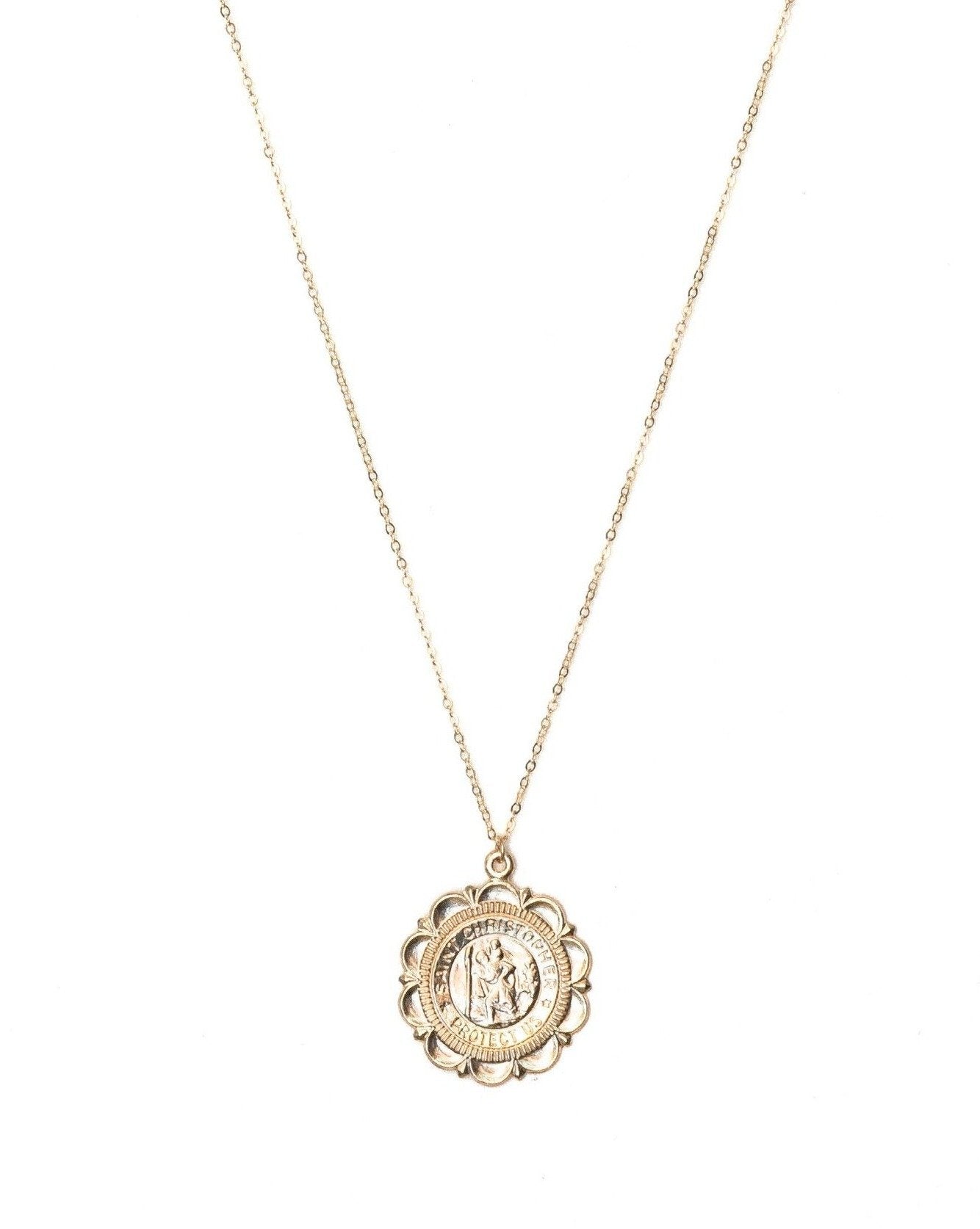 San Cris Long Necklace by KOZAKH. A 20 inches long necklace, crafted in 14K Gold Filled, featuring a 16mm Saint Christopher Medallion.