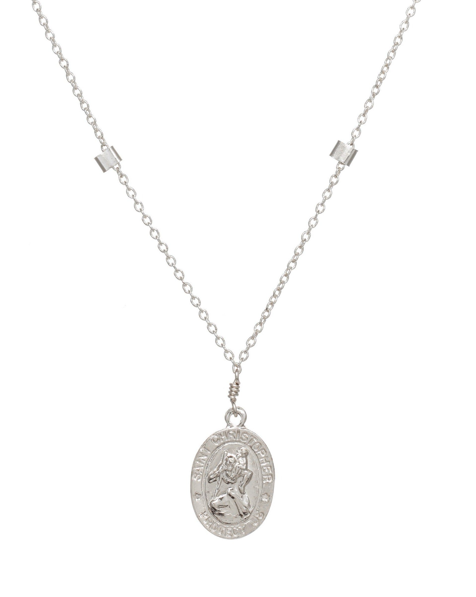 San Cris Oval Necklace by KOZAKH. A 16 to 18 inch adjustable length necklace, crafted in Sterling Silver, featuring a 16mm Saint Christopher oval Medallion.