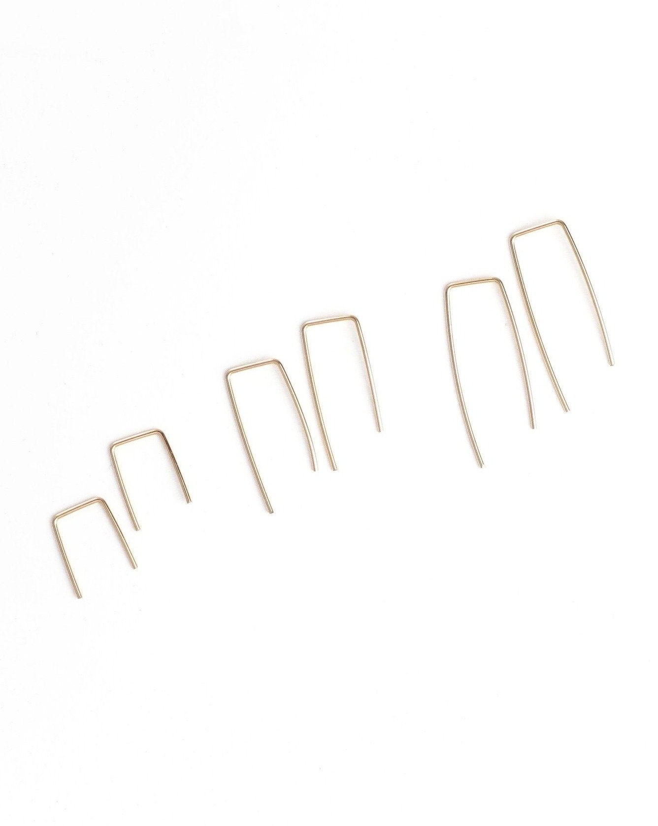 You Earrings by KOZAKH. Hand shaped minimalist bar earrings, crafted in 14K Gold Filled.