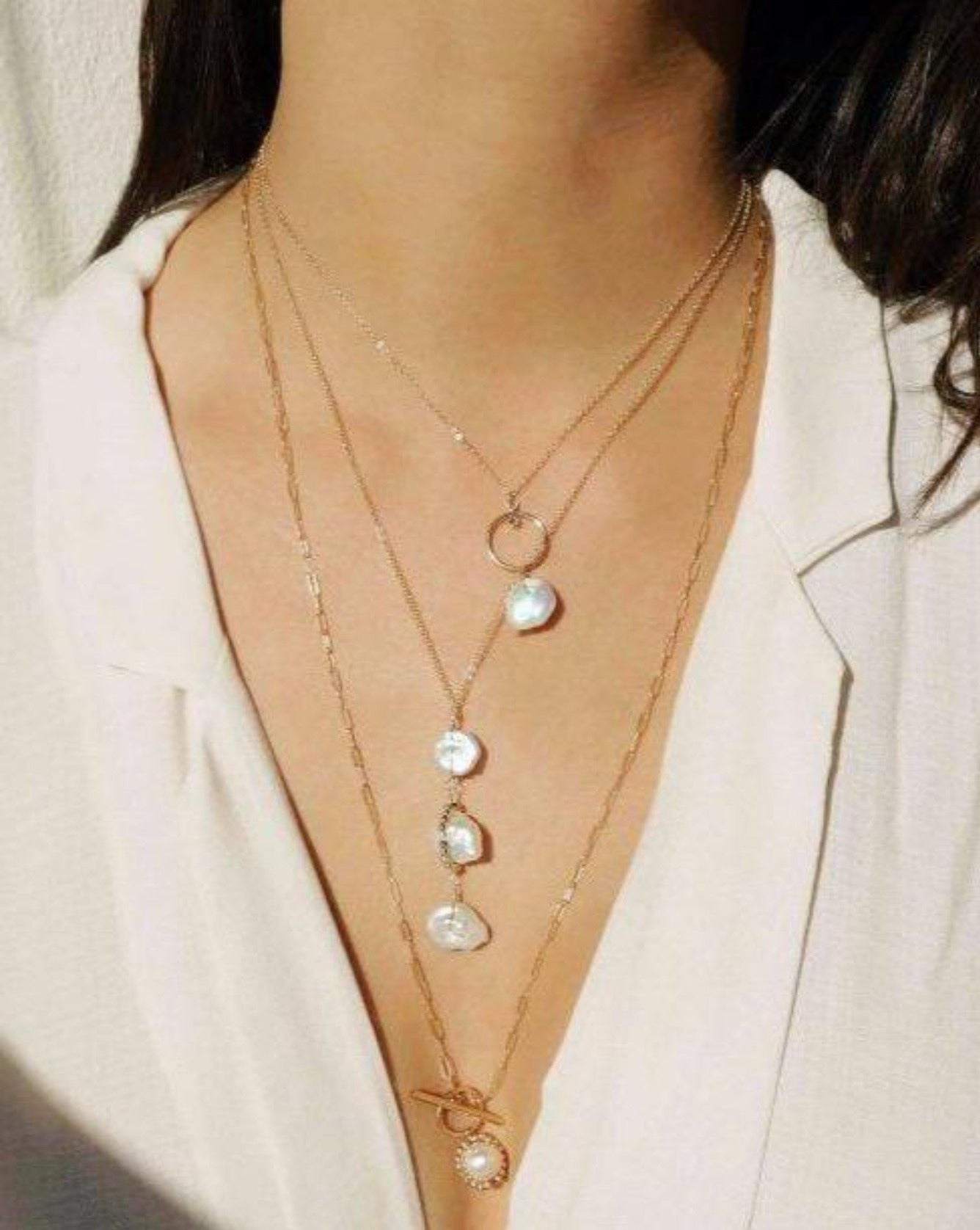Zaor Necklace by KOZAKH. A 16 to 25 inch adjustable length necklace, crafted in 14K Gold Filled, featuring a 9mm White potato pearl and 2mm Seamless beads.
