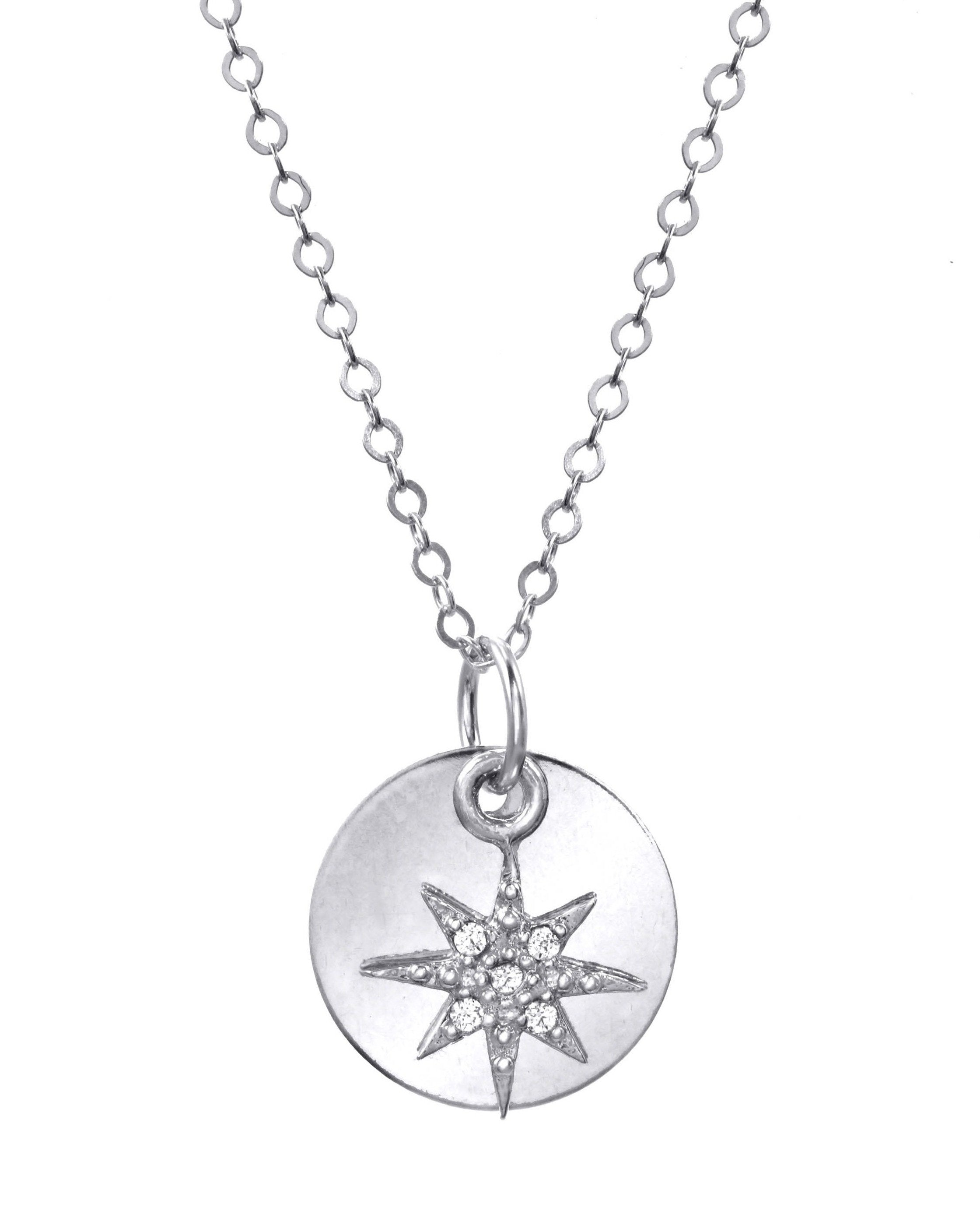 Adeena Necklace by KOZAKH. A 16 to 18 inch adjustable length necklace in Sterling Silver, featuring a coin charm and a Cubic Zirconia star charm.