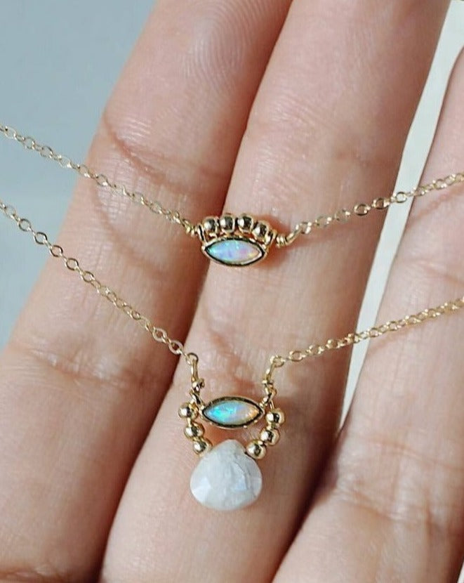 Ailbee Necklace by KOZAKH. A 16 to 18 inch adjustable length necklace in 14K Gold Filled, featuring a Marquise Opal charm and 2mm Gold Filled balls.