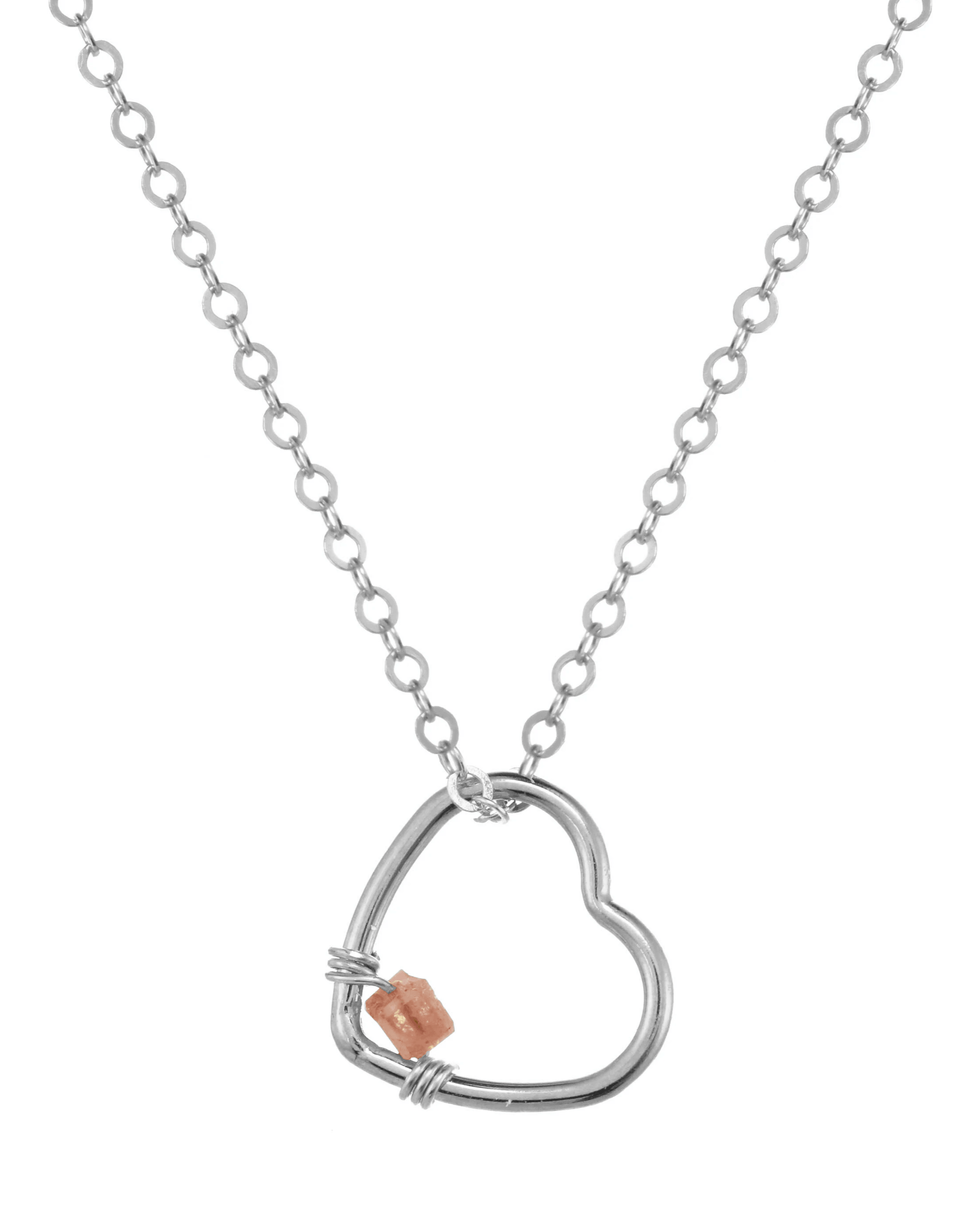 Amorcito Necklace by KOZAKH. A 16 to 18 inch adjustable length necklace in Sterling Silver, featuring a heart shaped charm with a square cut Brown Diamond.
