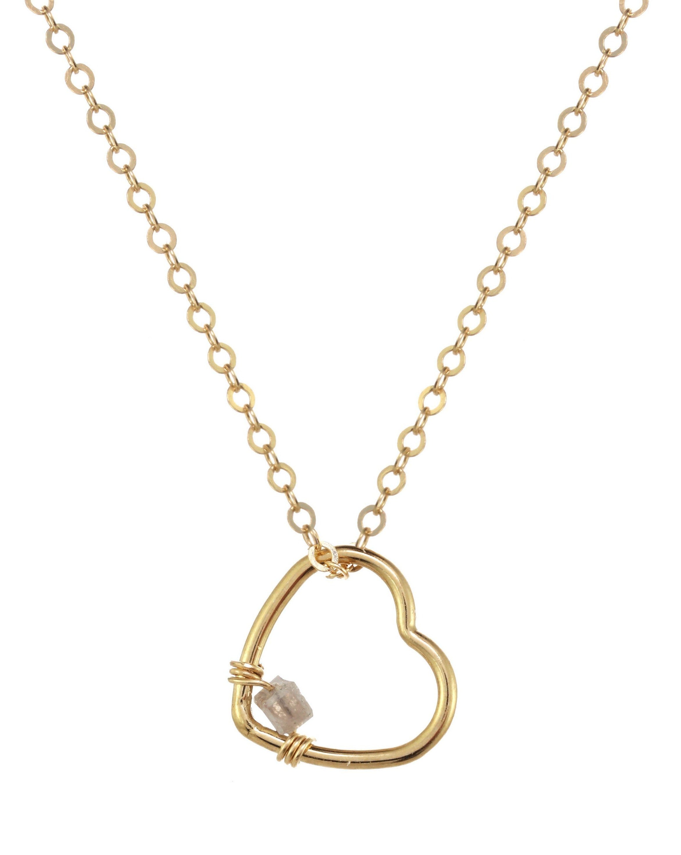 Amorcito Necklace by KOZAKH. A 16 to 18 inch adjustable length necklace in 14K Gold Filled, featuring a heart shaped charm with a square cut Grey Diamond.