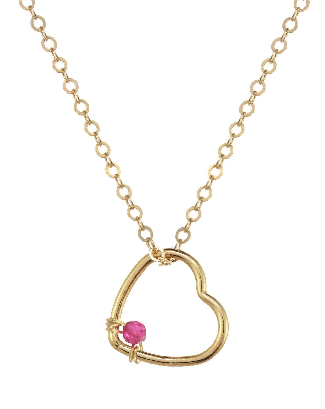 Amorcito Necklace by KOZAKH. A 16 to 18 inch adjustable length necklace in 14K Gold Filled, featuring a heart shaped charm with a round Ruby gem.