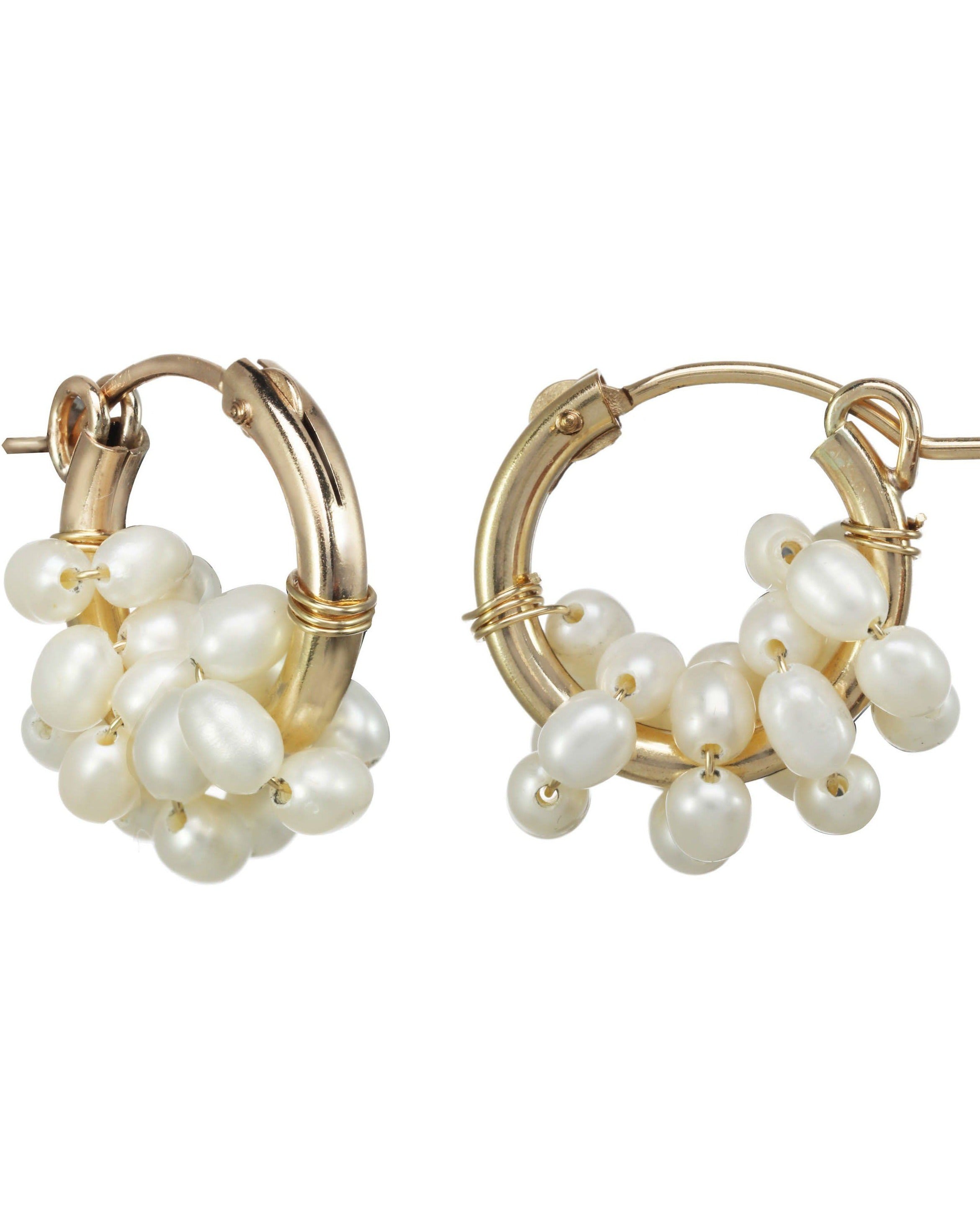 Areese Hoop Earrings by KOZAKH. 15mm hoop earrings with snap closure, crafted in 14K Gold Filled and embellished with 5mm white Rice Pearls.