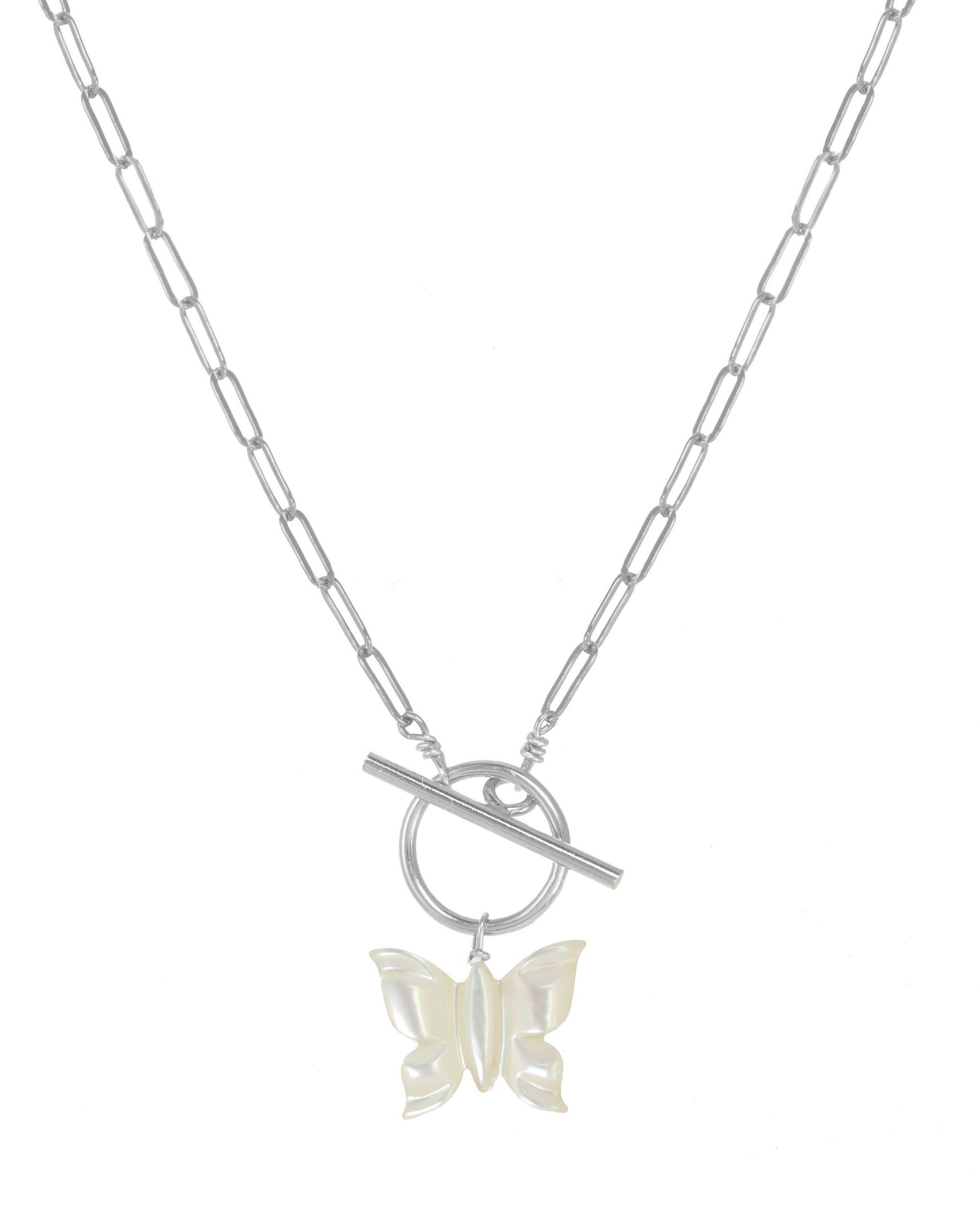 Arlette Necklace by KOZAKH. A 16 to 18 inch adjustable length necklace in Sterling Silver, featuring a hand-carved Mother of Pearl butterfly charm and a toggle closure at front of the necklace.