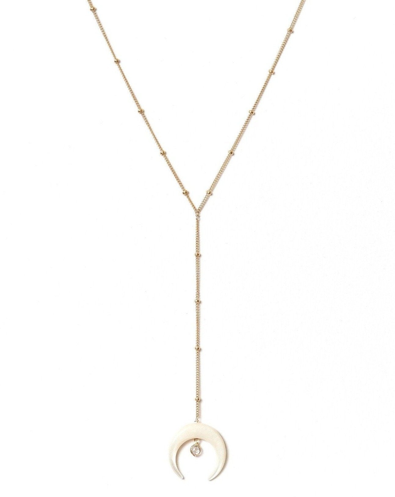 Baque Lar Necklace by KOZAKH. A 16 to 18 inch adjustable length, 3 inches chain drop lariat style necklace in 14K Gold Filled, featuring a hand-carved Mother of Pearl moon charm and a 2mm Swarovski Crystal.