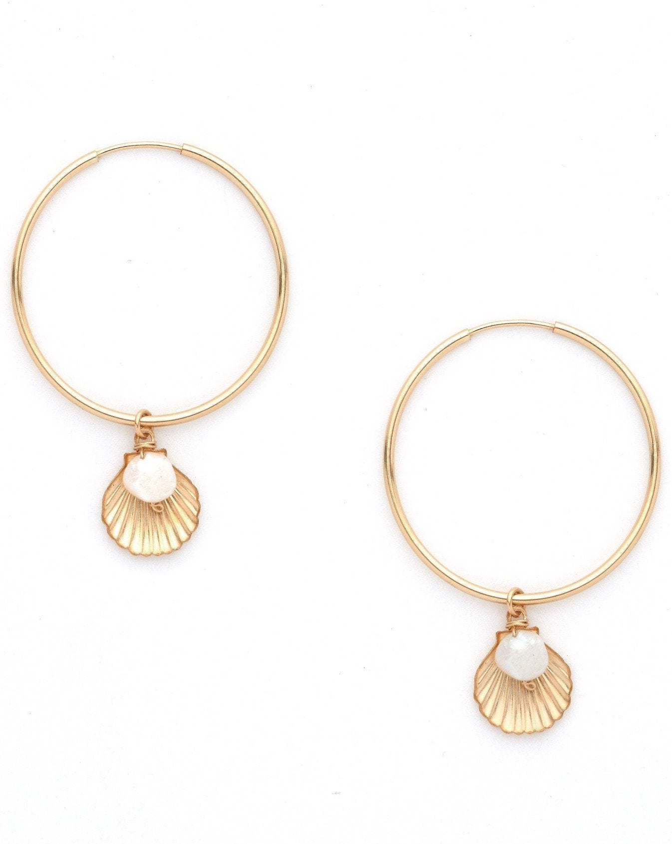 Belle Hoop Earrings by KOZAKH. A 30mm hoop earrings in 14K Gold Filled, featuring a 5mm flat irregular Pearl and a Shell charm.