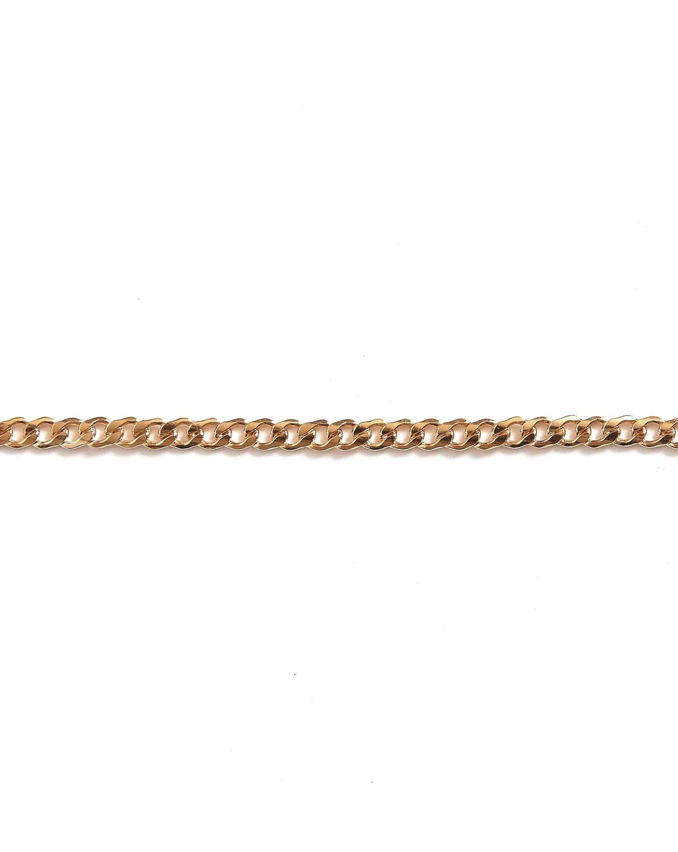 Braided Bracelet by KOZAKH. A 6 to 7 inch adjustable length chain bracelet in 14K Gold Filled.