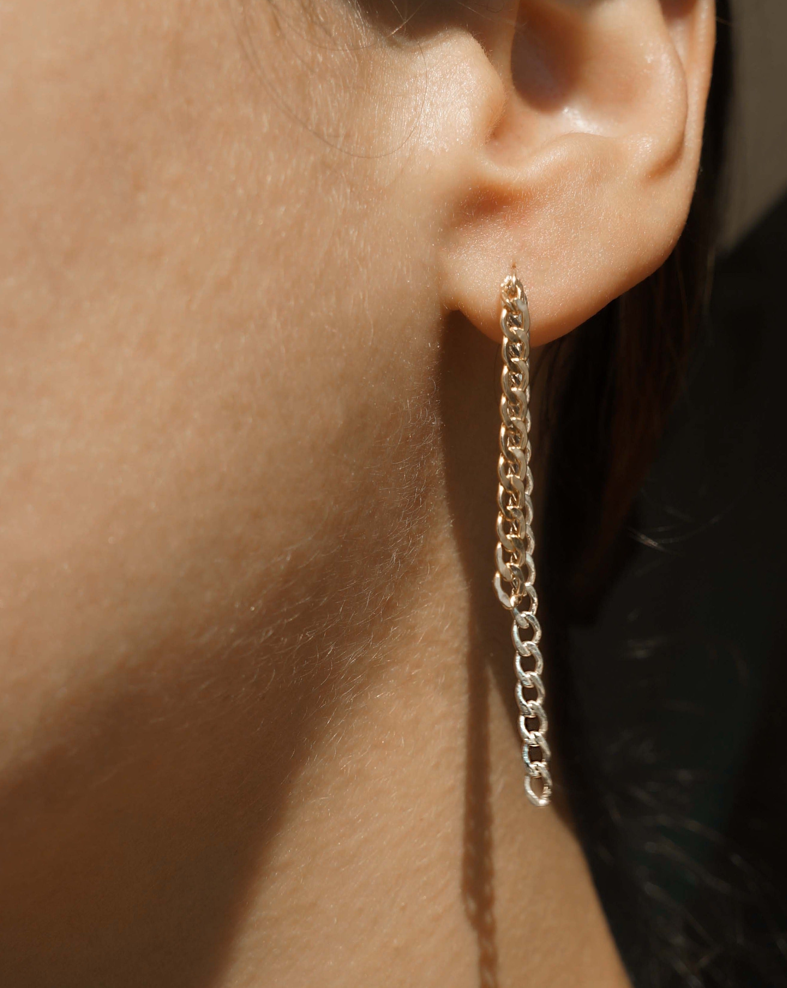 Cadenetta Earrings by KOZAKH. 3 inch drop double strand Flat Curb chain earrings in 14K Gold Filled and Sterling Silver. One strand is gold and one is silver.