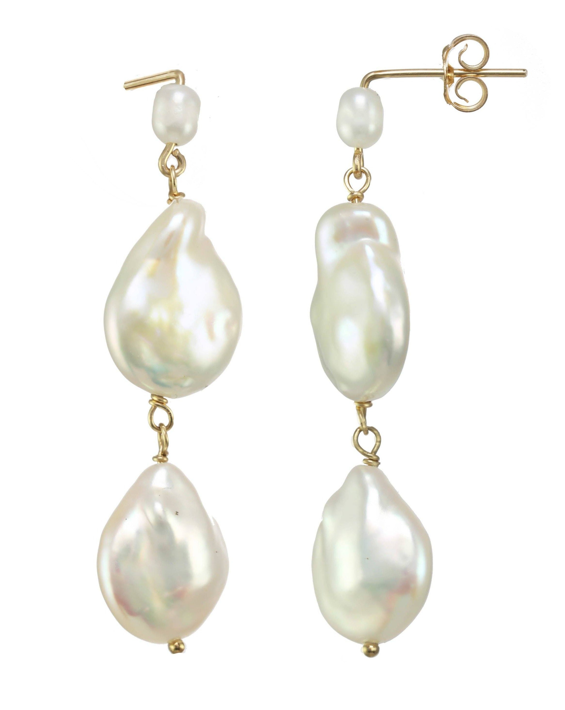 Caro Earrings by KOZAKH. Dangling earrings in 14K Gold Filled with an earring drop length of 2 inches, featuring Freshwater Baroque Pearls.