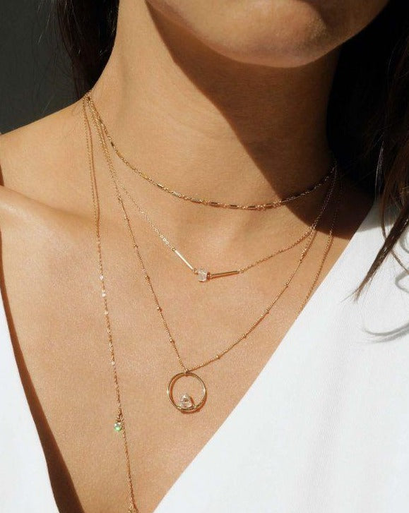 Cobar Herkimer Necklace by KOZAKH. A 16 to 18 inch adjustable length necklace in 14K Gold Filled, featuring a Herkimer Diamond.