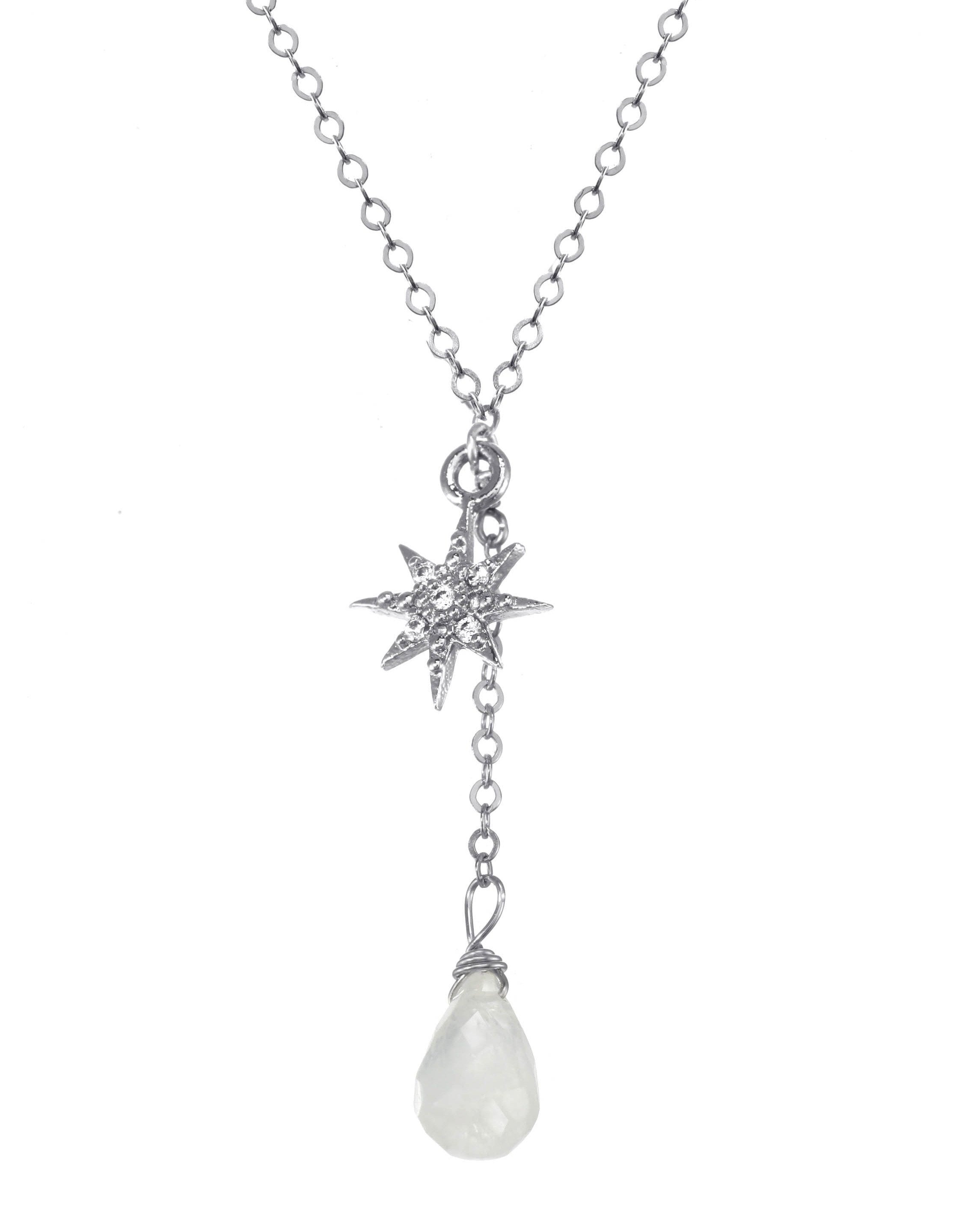 Corvus Necklace by KOZAKH. A 16 to 18 inch adjustable length, lariat style necklace in Sterling Silver, featuring a faceted Moonstone droplet and a Cubic Zirconia 8 point star charm.