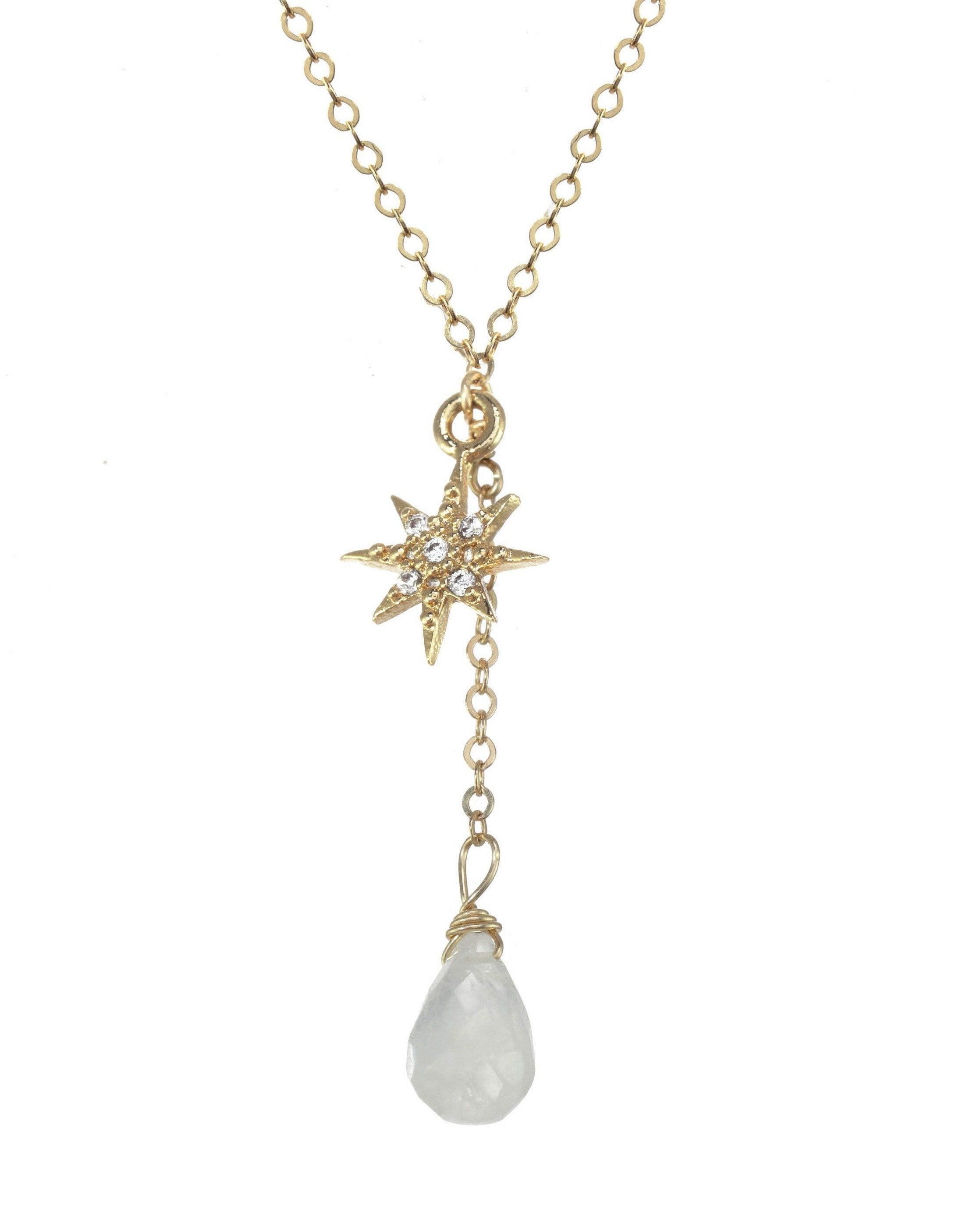 Corvus Necklace by KOZAKH. A 16 to 18 inch adjustable length, lariat style necklace in 14K Gold Filled, featuring a faceted Moonstone droplet and a Cubic Zirconia 8 point star charm.