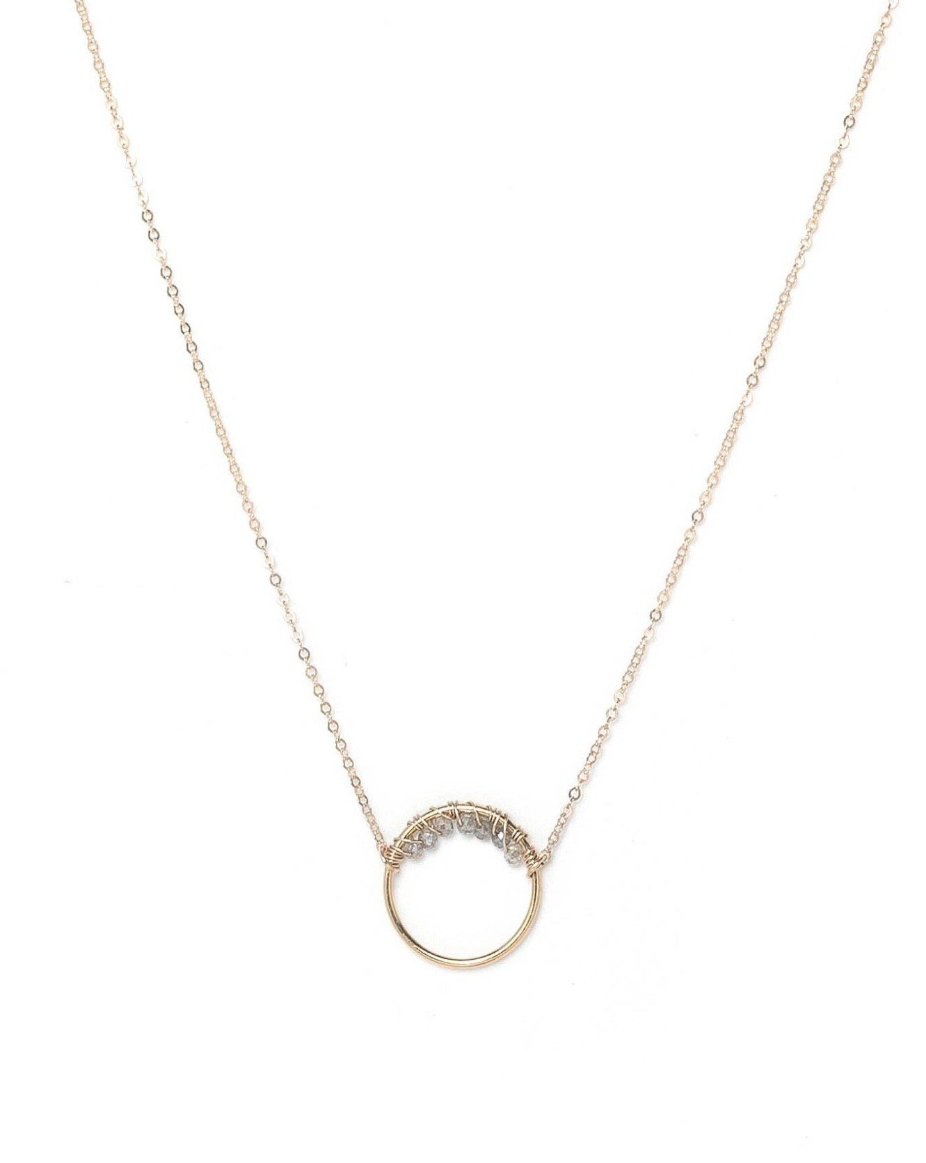 Curra Necklace by KOZAKH. A 16 to 18 inch adjustable length necklace in 14K Gold Filled, featuring a ring with 2mm faceted round Labradorite gems.