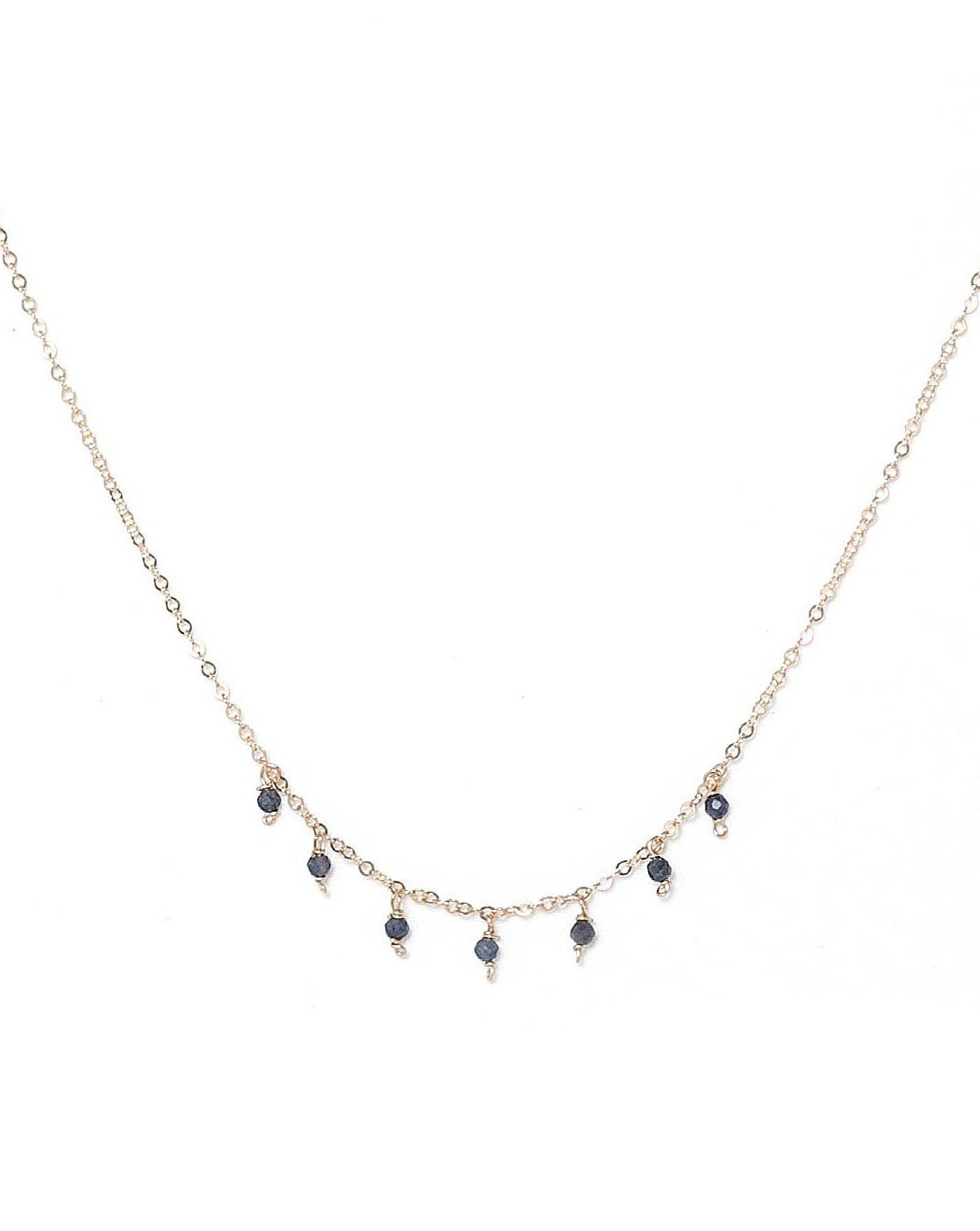 Cuy Necklace by KOZAKH. A 16 to 18 inch adjustable length necklace in 14K Gold Filled, featuring 2mm faceted round Sapphire gems.