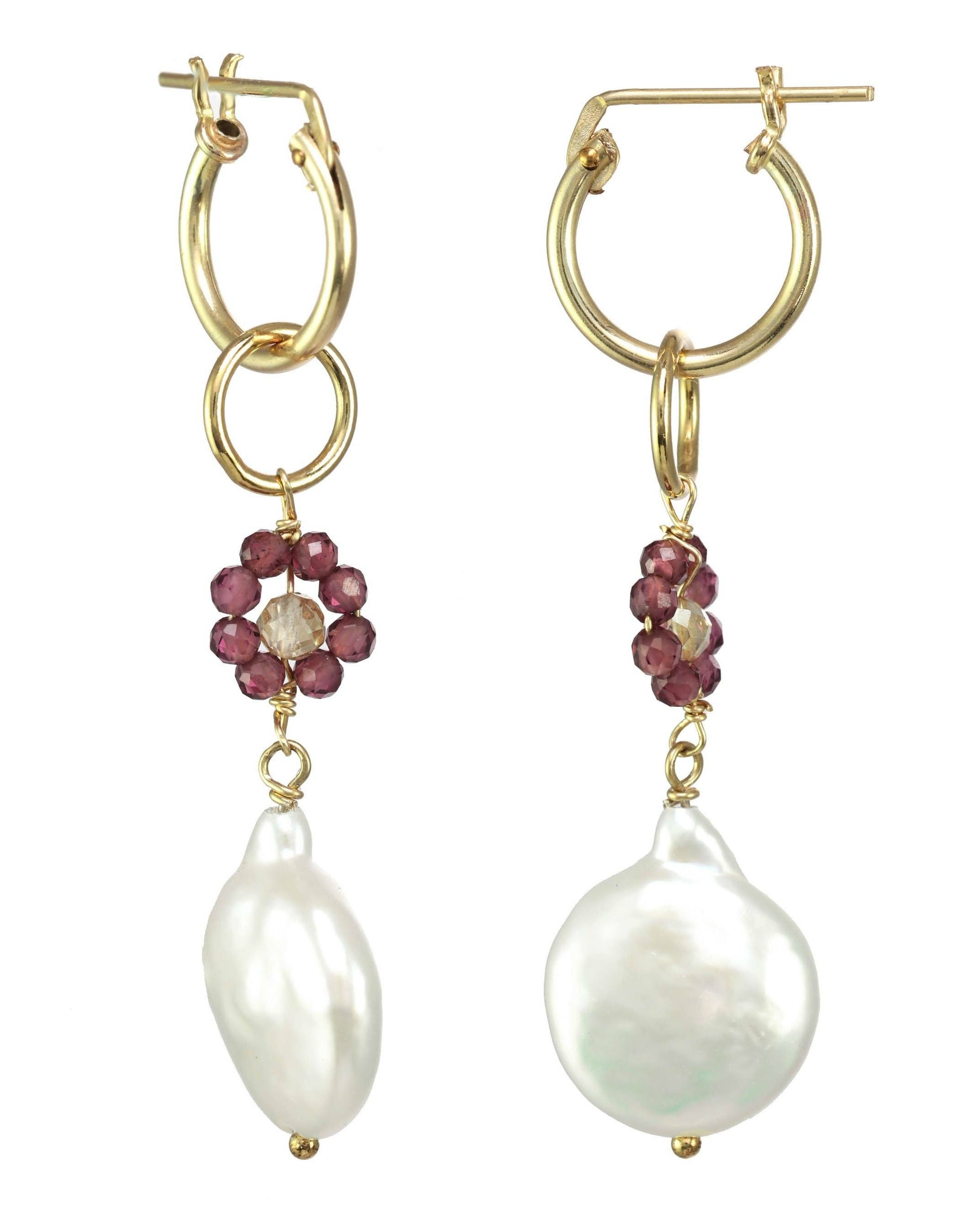 Daisy Del Mar Earrings by Kozakh. 12mm Snap closure hoops crafted in 14K Gold Filled, featuring 2mm Garnet and 3mm Imperial Topaz forming a flower charm, and a Baroque Pearl.