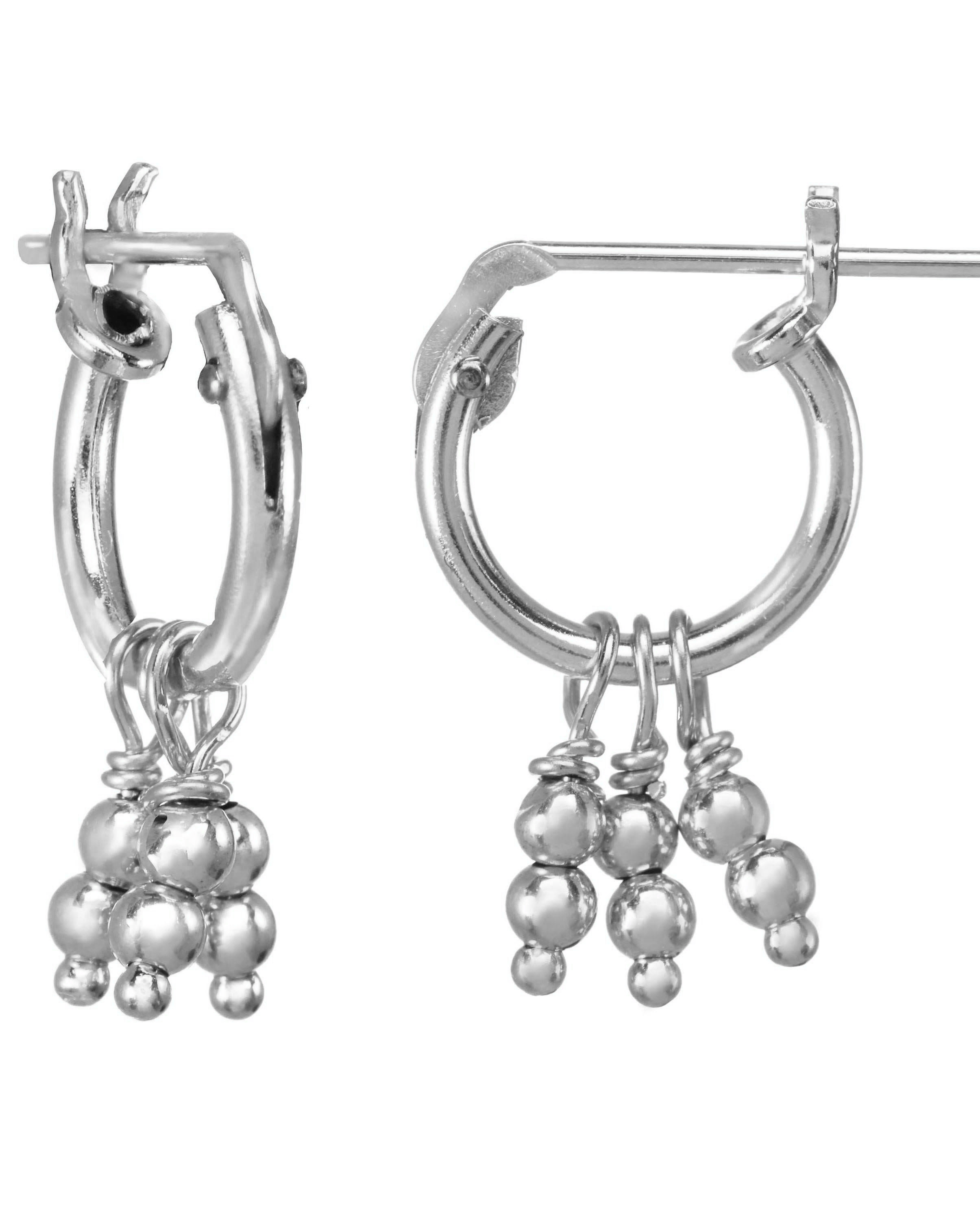 Daphne Hoop Earrings by Kozakh. 10mm Snap closure hoops crafted in Sterling Silver, featuring dangling silver balls.
