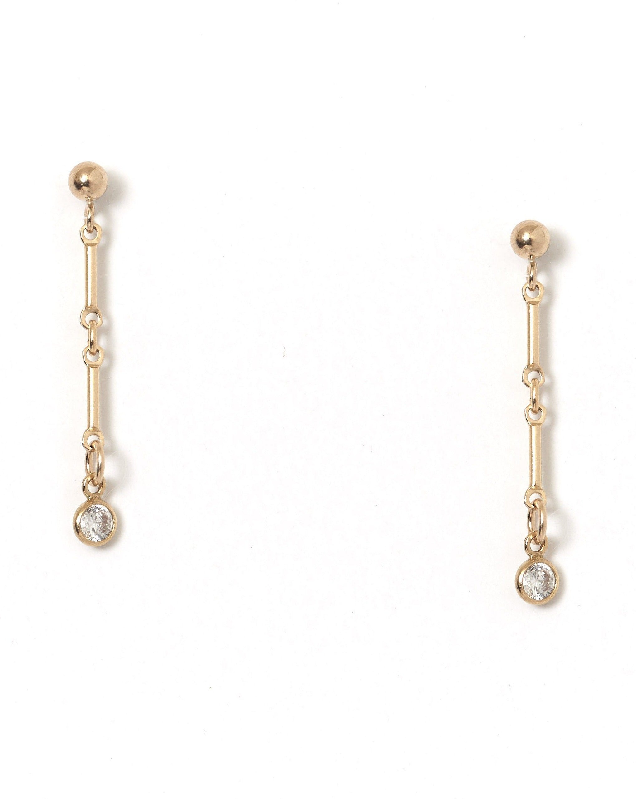 Desos Earrings by KOZAKH. 2 inch drop, 3mm Ball stud earrings, crafted in 14K Gold Filled, featuring a 3mm Swarovski Crystal bezel.