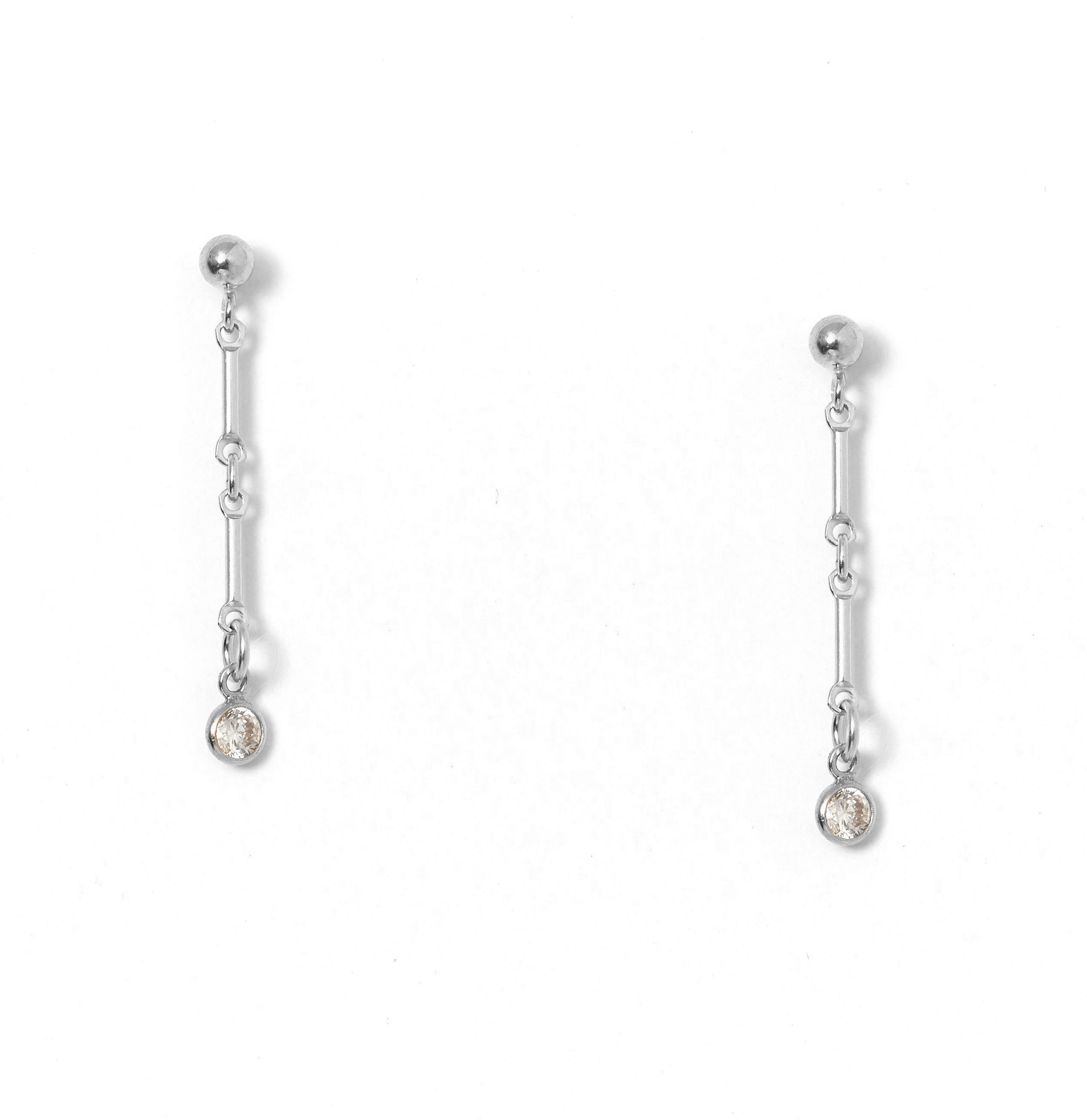Desos Earrings by KOZAKH. 2 inch drop, 3mm Ball stud earrings, crafted in Sterling Silver, featuring a 3mm Swarovski Crystal bezel.