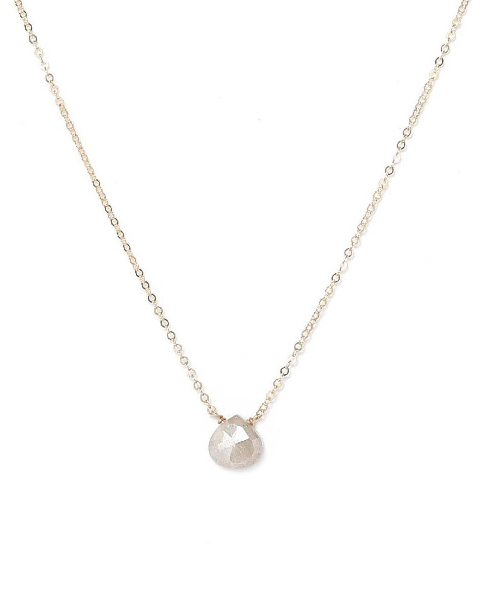 Dia Necklace by KOZAKH. A 16 to 18 inch adjustable length necklace in 14K Gold Filled, featuring a faceted White Sapphire.