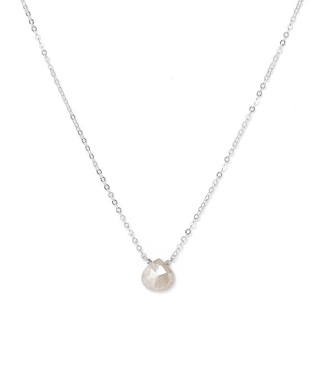 Dia Necklace by KOZAKH. A 16 to 18 inch adjustable length necklace in Sterling Silver, featuring a faceted White Sapphire.