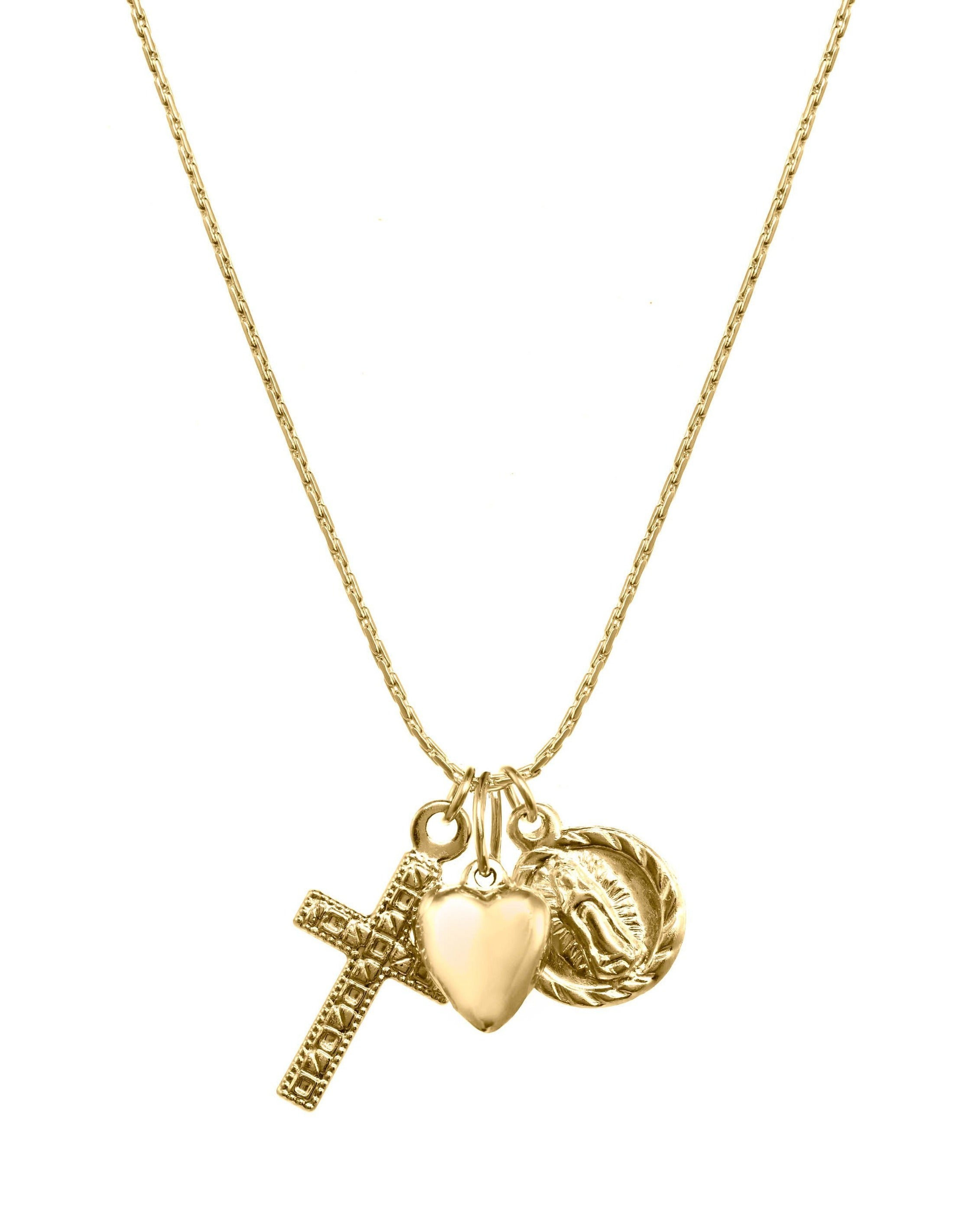 Domingo Necklace by KOZAKH. A 16 to 18 inch adjustable length necklace in 14K Gold Filled, featuring a Saint Christopher medallion, a 6mm Heart charm, and a Filigree decorated cross.