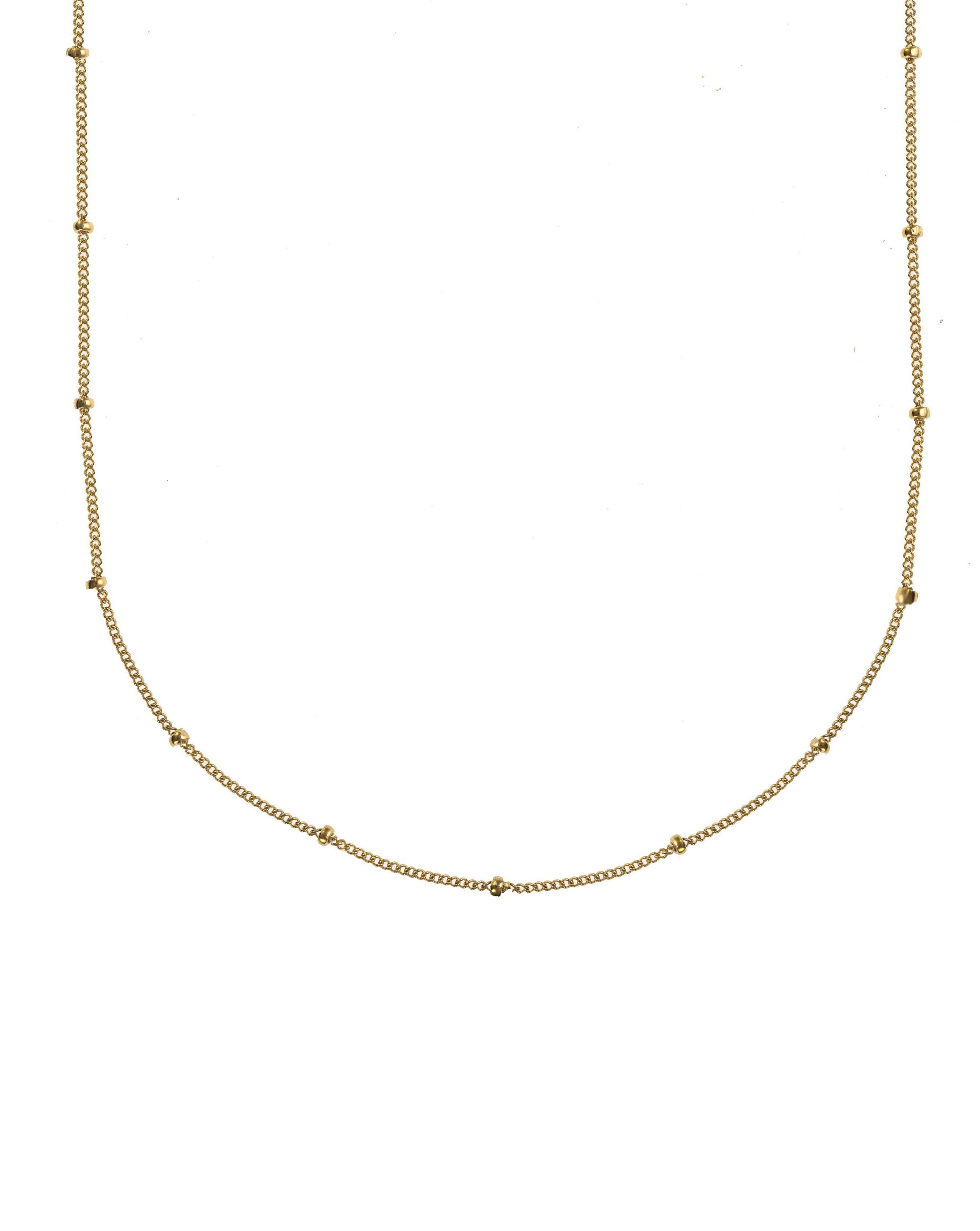 Dots Choker by KOZAKH. A 12 to 14 inch adjustable length necklace in 14K Gold Filled, featuring a 1mm curb chain with balls design.