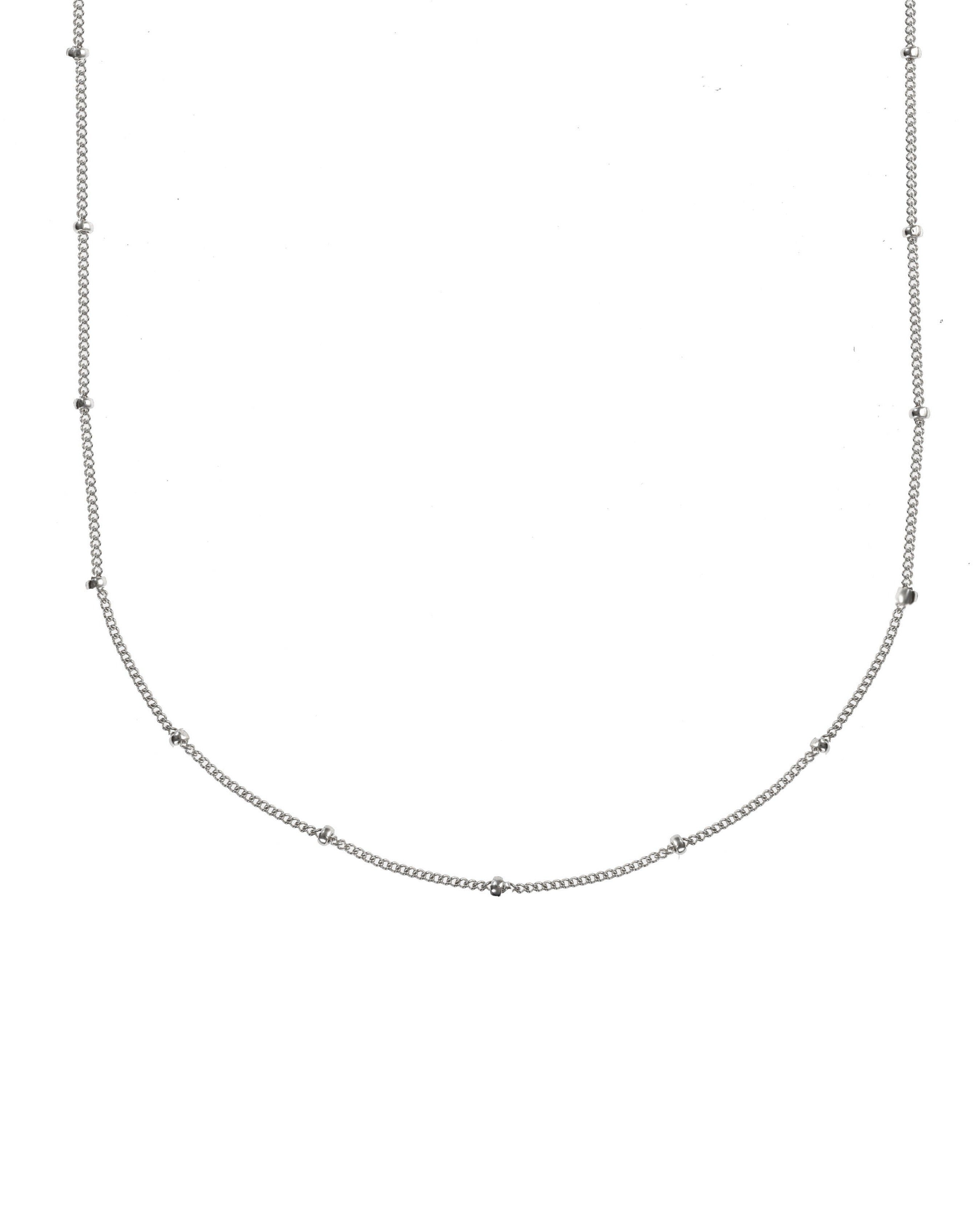 Dots Choker by KOZAKH. A 12 to 14 inch adjustable length necklace in Sterling Silver, featuring a 1mm curb chain with balls design.