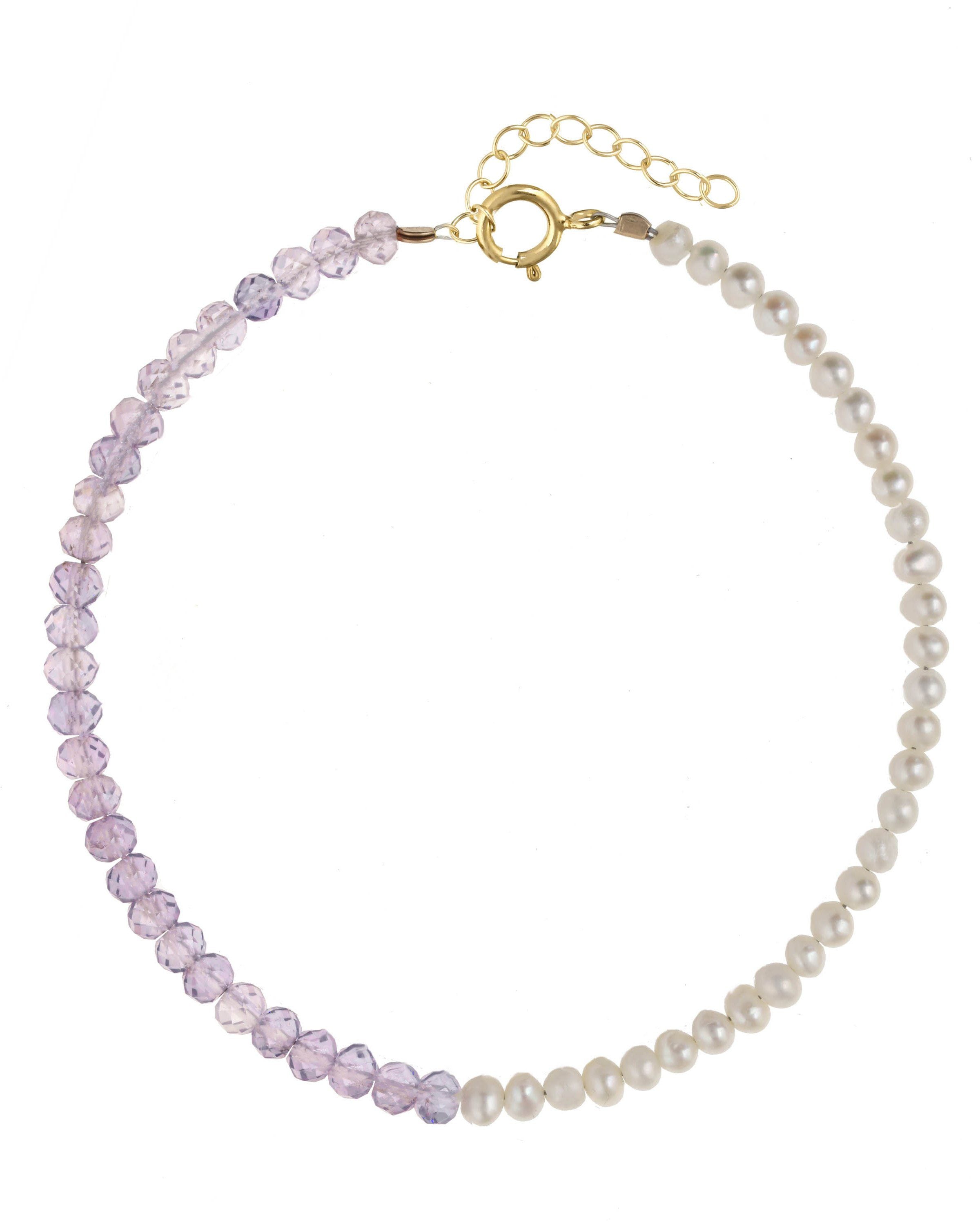 Elo Bracelet by KOZAKH. A 6 to 7 inch adjustable length bracelet, crafted in 14K Gold Filled. Half of the bracelet strand features 3.5mm Freshwater Pearls and 3.5mm Faceted Amethyst beads on the other half.