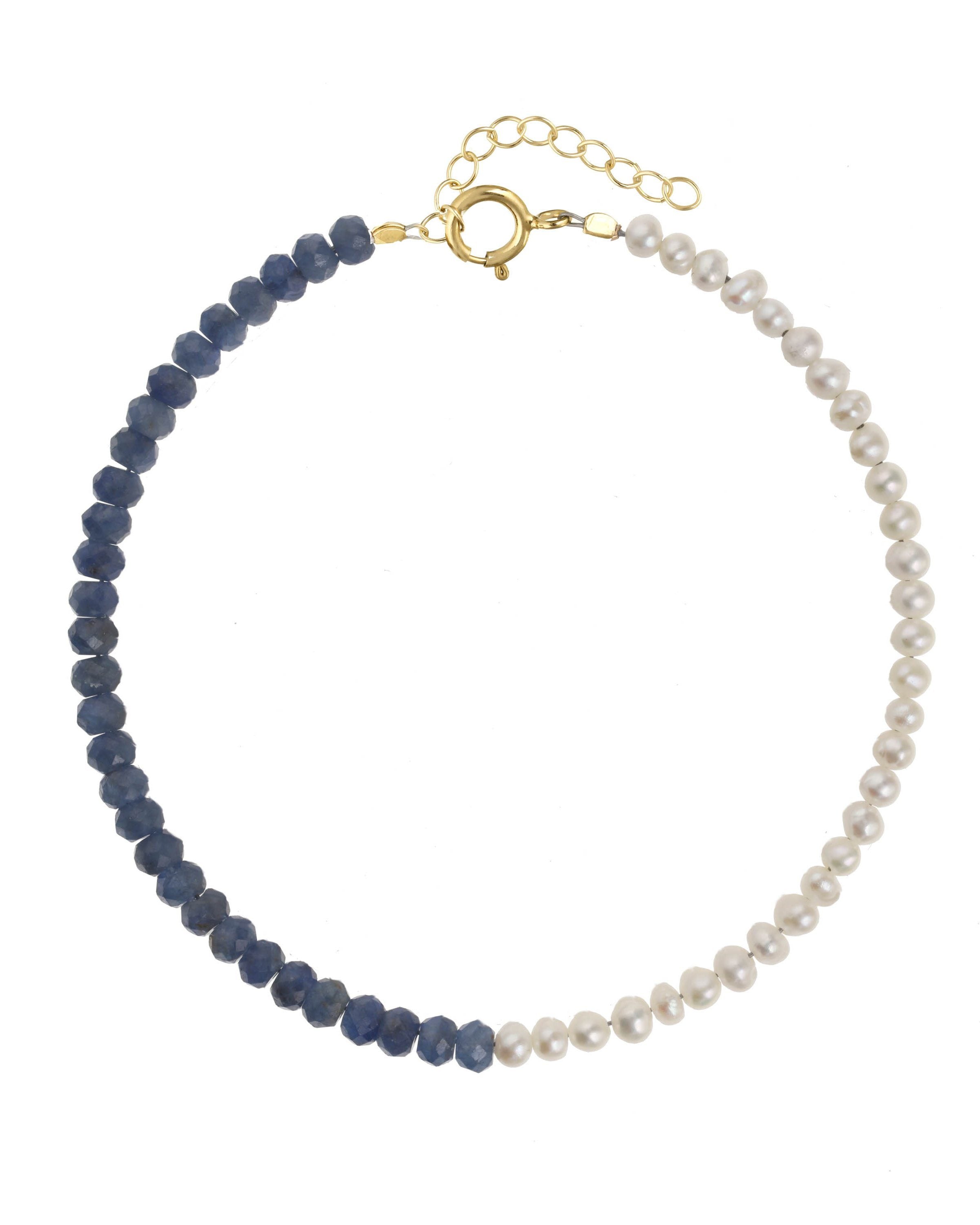 Elo Bracelet by KOZAKH. A 6 to 7 inch adjustable length bracelet, crafted in 14K Gold Filled. Half of the bracelet strand features 3.5mm Freshwater Pearls and 3.5mm Faceted Sapphire beads on the other half.