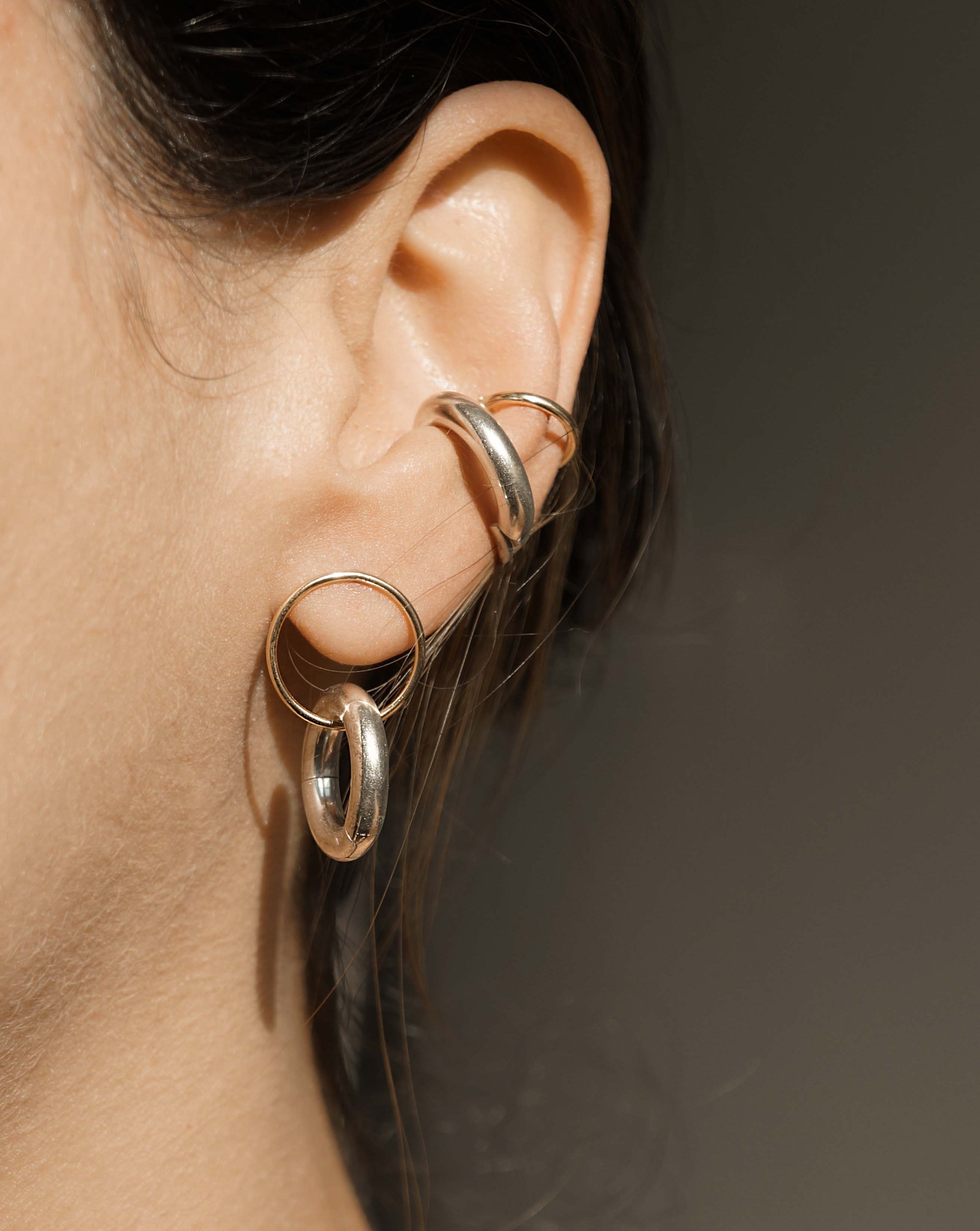Emma Huggie by Kozakh. A clip on snap closure - no piercing required huggie style earring, crafted in Sterling Silver.