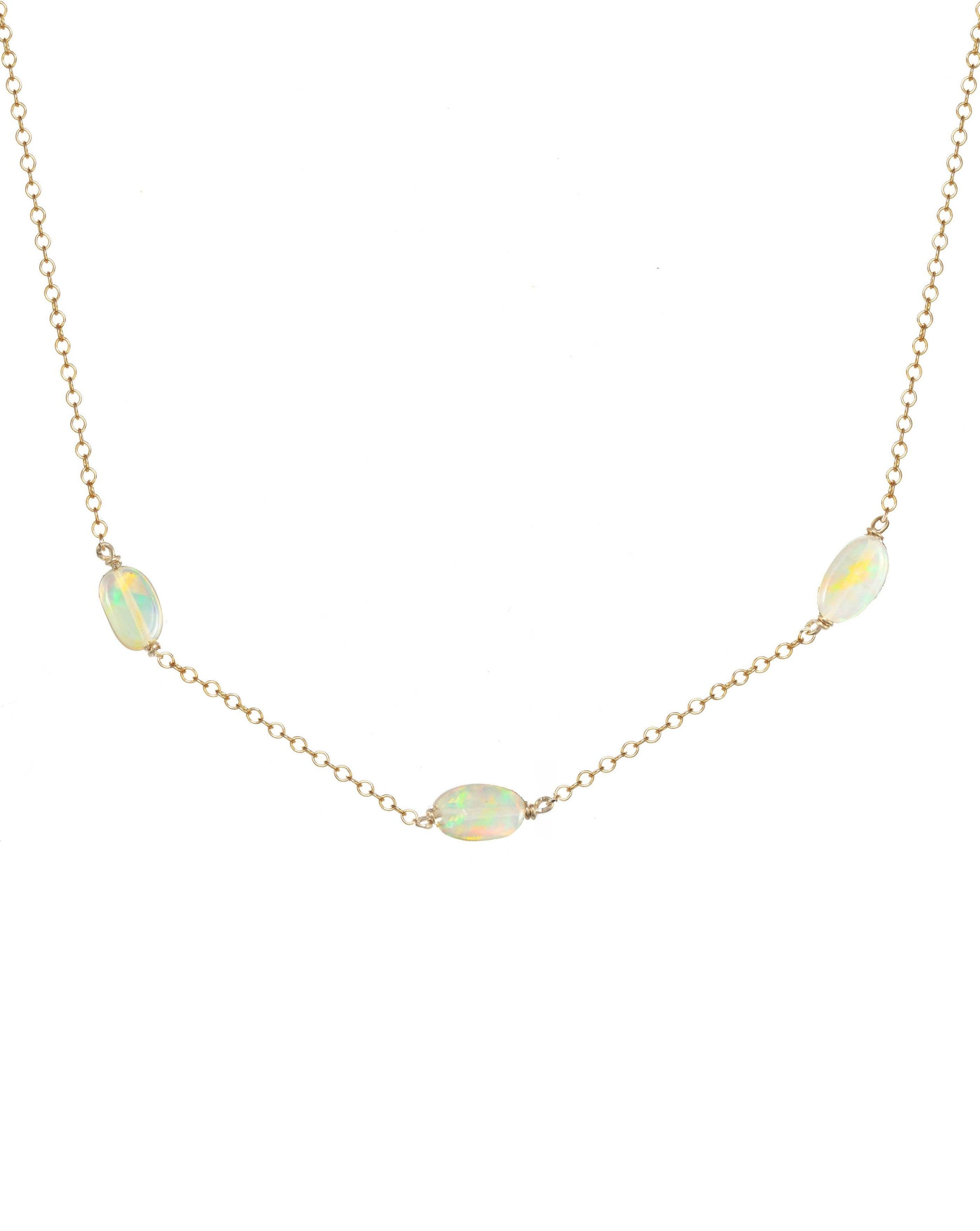 Erin Fire Necklace by KOZAKH. A 16 to 18 inch adjustable length necklace in 14K Gold Filled, featuring 4mm to 5mm smooth Fire Opal gems.
