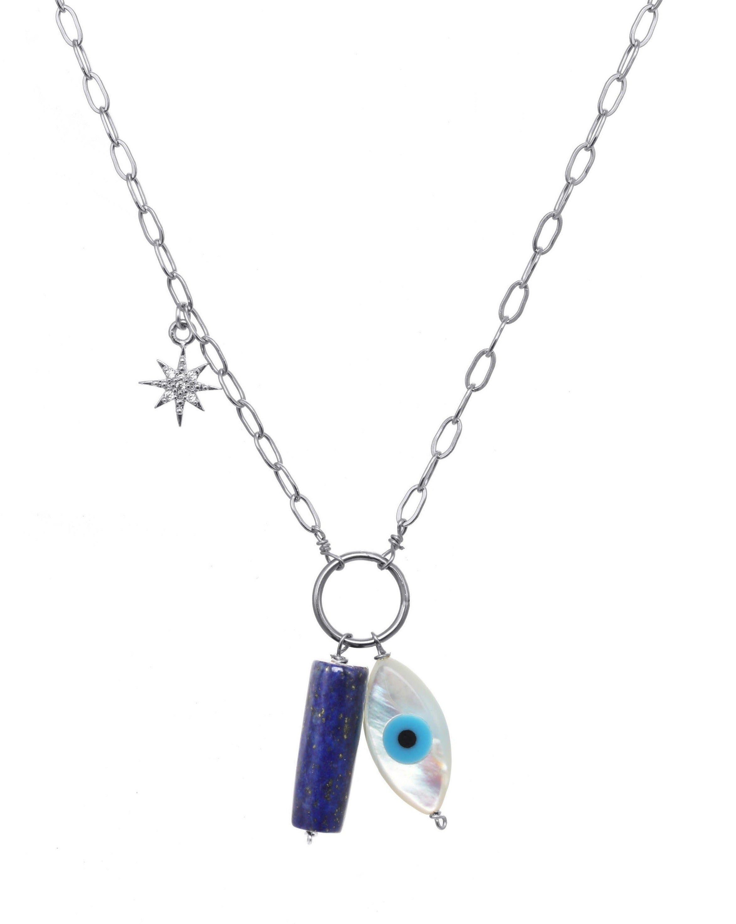 Eye Chakra Necklace by KOZAKH. A Sterling Silver necklace with adjustable length from 20 inches, featuring a hand carved Mother of Pearl Evil Eye, a cylindrical cut Lapis, and a Cubic Zirconia encrusted star charm.