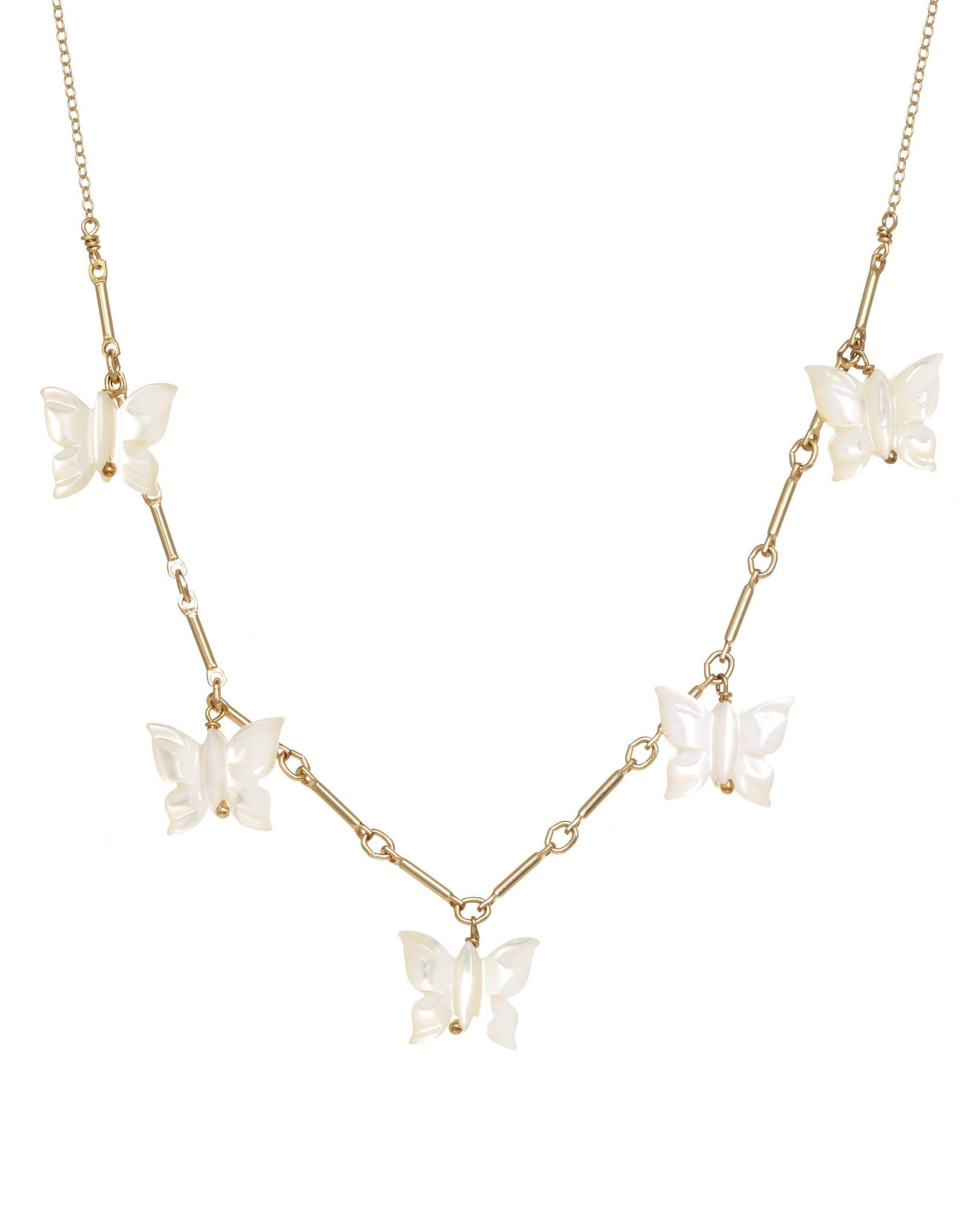 Fallon Necklace by KOZAKH. A 16 to 18 inch adjustable length, bar link chain necklace in 14K Gold Filled, featuring hand-carved Mother of Pearl butterfly charms. 