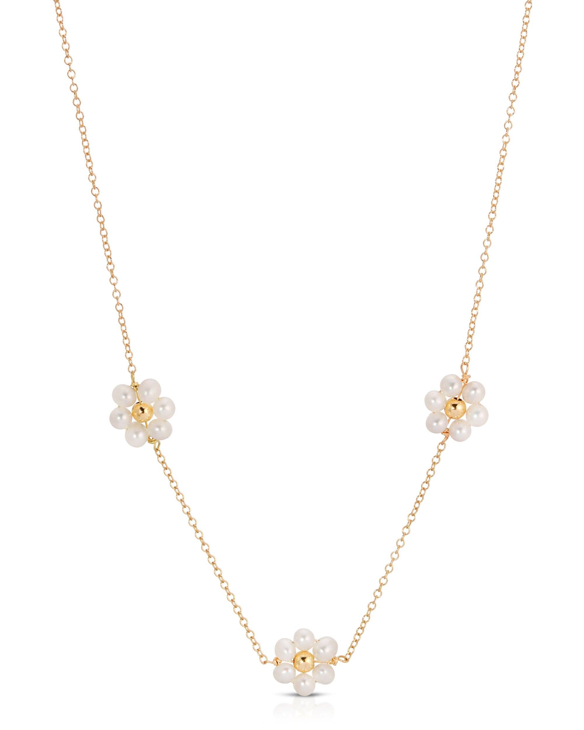 Fiores Choker Necklace by KOZAKH. A 13.5 to 15.5 inch adjustable length choker necklace, crafted in 14K Gold Filled, featuring 3mm Freshwater Pearls in form of daisies.