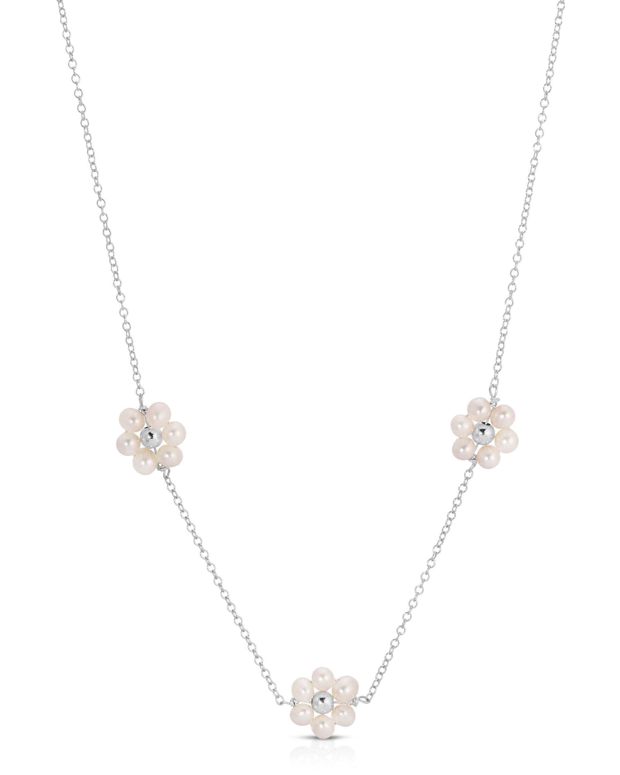 Fiores Choker Necklace by KOZAKH. A 13.5 to 15.5 inch adjustable length choker necklace, crafted in Sterling Silver, featuring 3mm Freshwater Pearls in form of daisies.
