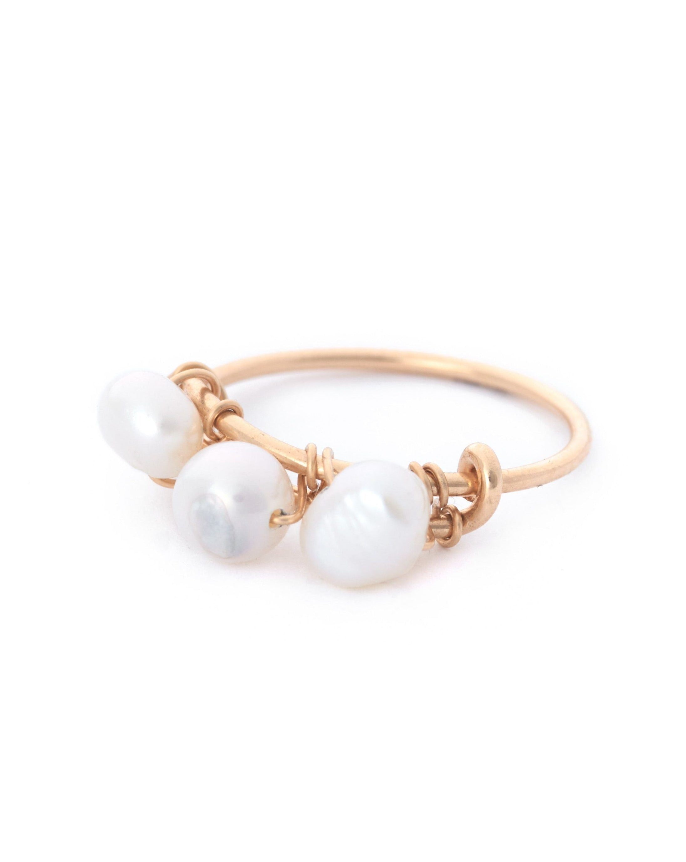 Gem Braided Ring by KOZAKH. A 1mm thick ring, crafted in 14K Gold Filled, featuring braided Pearls.