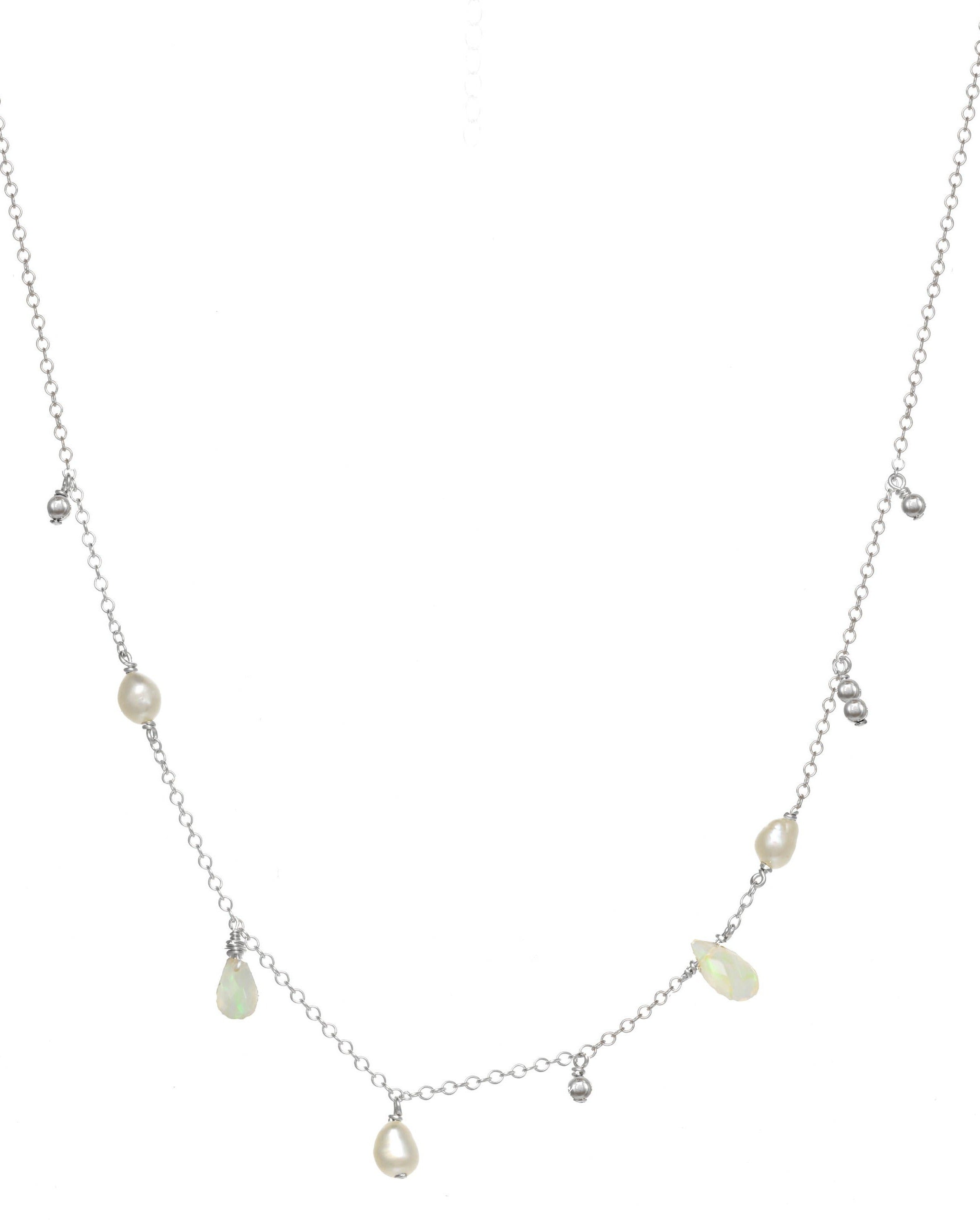Genevieve Necklace by KOZAKH. A 16 to 18 inch adjustable length necklace in Sterling Silver, featuring 3-4mm white rice Pearls and 5-6mm faceted Ethiopian Opal droplets.