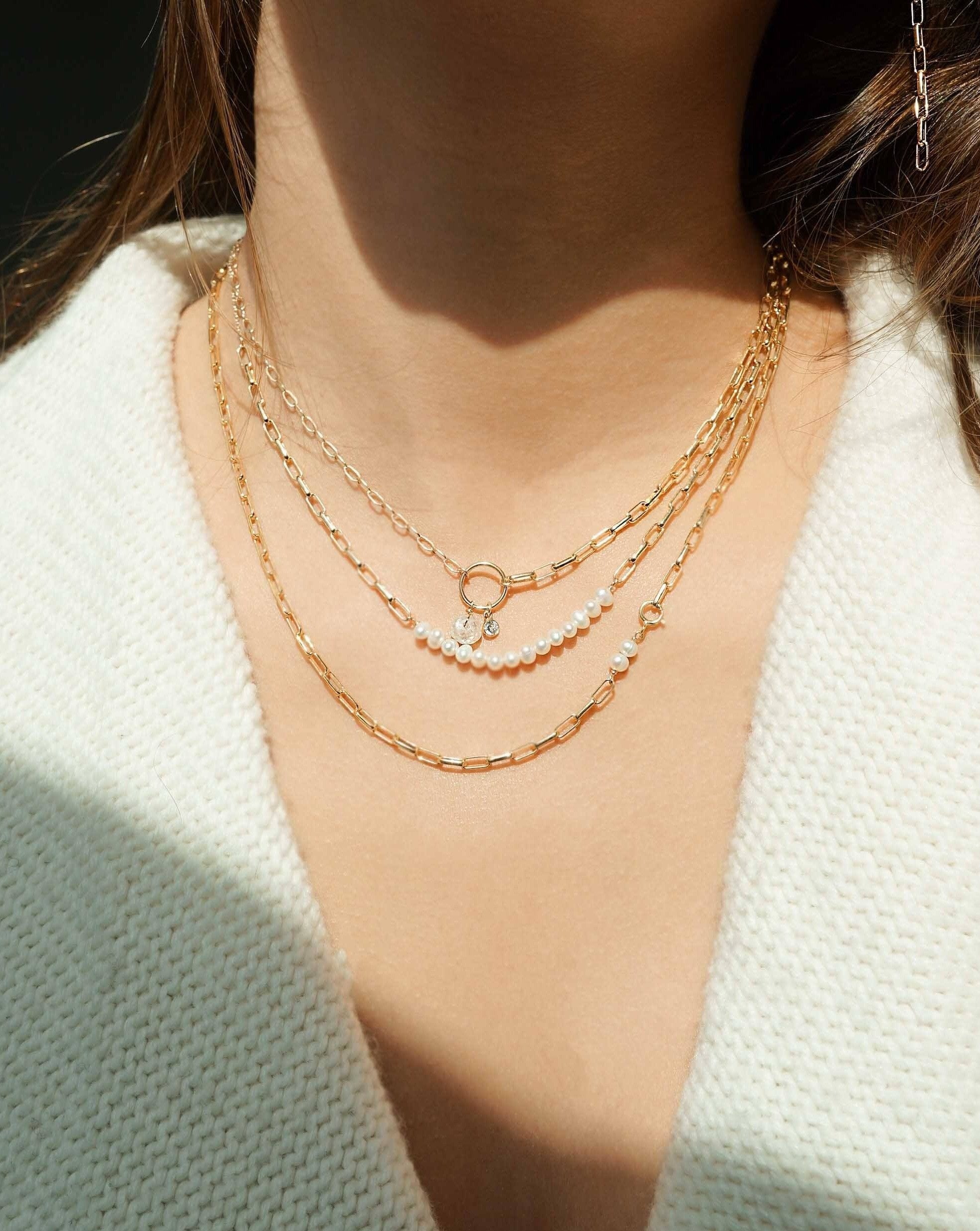 Harini Necklace by KOZAKH. A 18 inch long necklace in 14K Gold Filled, featuring 5mm white potato Pearls.